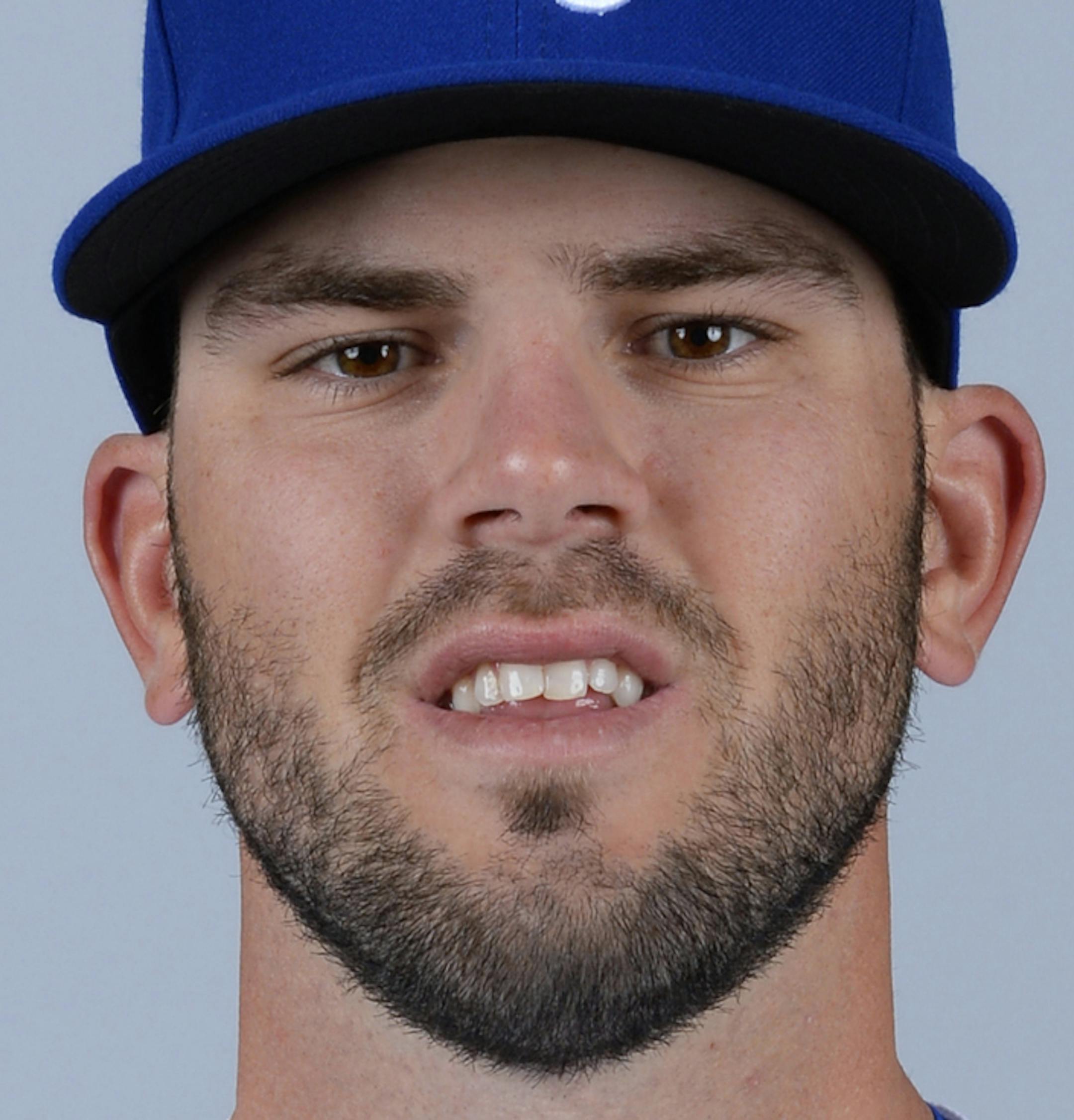 SURPRISE, AZ - FEBRUARY 27: Mike Moustakas #8 of the Kansas City Royals poses during Photo Day on Friday, February 27, 2015 at Surprise Stadium in Surprise, Arizona. (Photo by Ron Vesely/MLB Photos via Getty Images) *** Local Caption *** Mike Moustakas ORG XMIT: 532475017