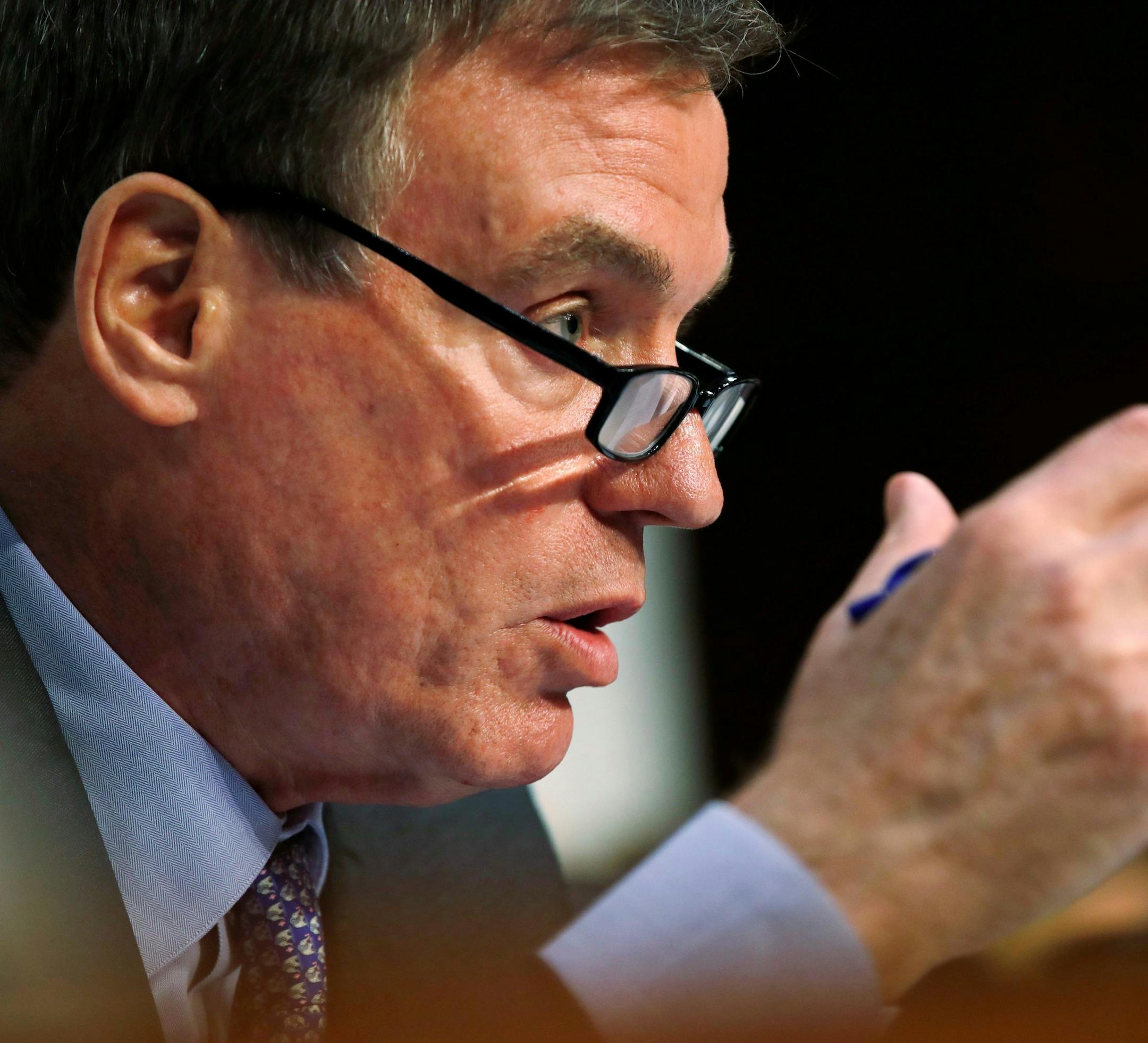 FILE - In this Tuesday, June 13, 2017, file photo, Senate Intelligence Committee Vice Chairman Sen. Mark Warner, D-Va., asks questions during a committee hearing on Capitol Hill in Washington. Warner is writing a bill that would require social media companies to disclose who funded political ads, similar to television broadcasters. Facebook CEO Mark Zuckerberg said Thursday, Sept. 21, 2017, that the company would require similar disclosures. (AP Photo/Jacquelyn Martin, File) ORG XMIT: NYBZ467