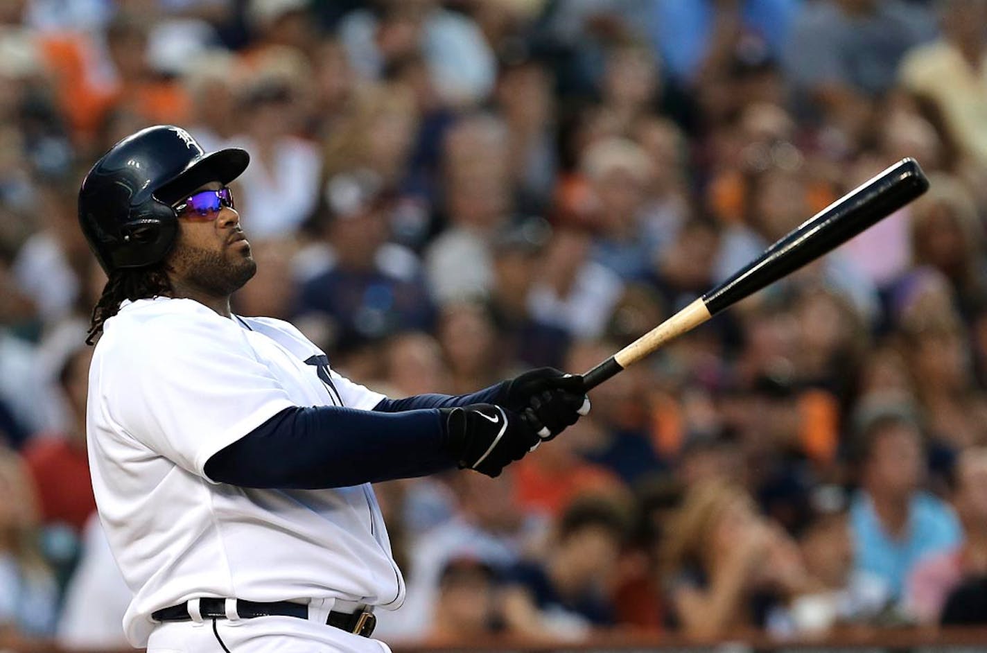 Detroit Tigers' Prince Fielder hits a solo home run against the Minnesota Twins during the fourth inning of a baseball game in Detroit, Tuesday, Aug. 20, 2013.