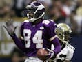 Vikings receiver Randy Moss reacts after catching a touchdown pass in 2001.