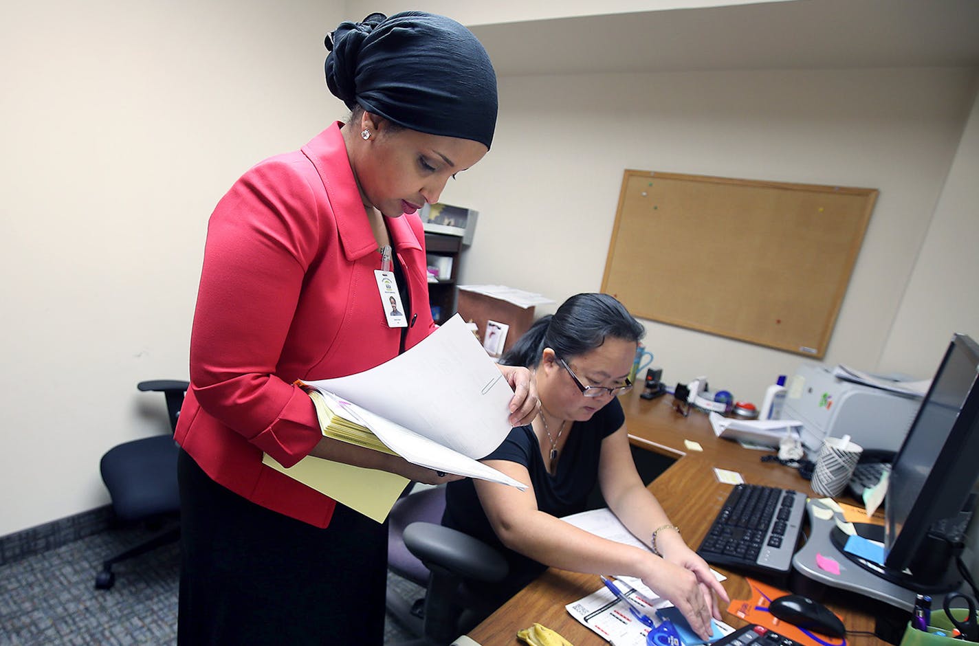 Sahra Noor made her way to different departments at People's Center Health Service Clinic, Thursday, December 18, 2014 in Minneapolis, MN. ] (ELIZABETH FLORES/STAR TRIBUNE) ELIZABETH FLORES &#x201a;&#xc4;&#xa2; eflores@startribune.com ORG XMIT: MIN1412181604020163