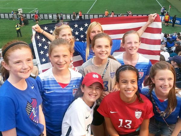 A group of girls from the Edina Soccer Club and their families made the trek to Winnipeg, Manitoba to chear for the women's national team in the Women