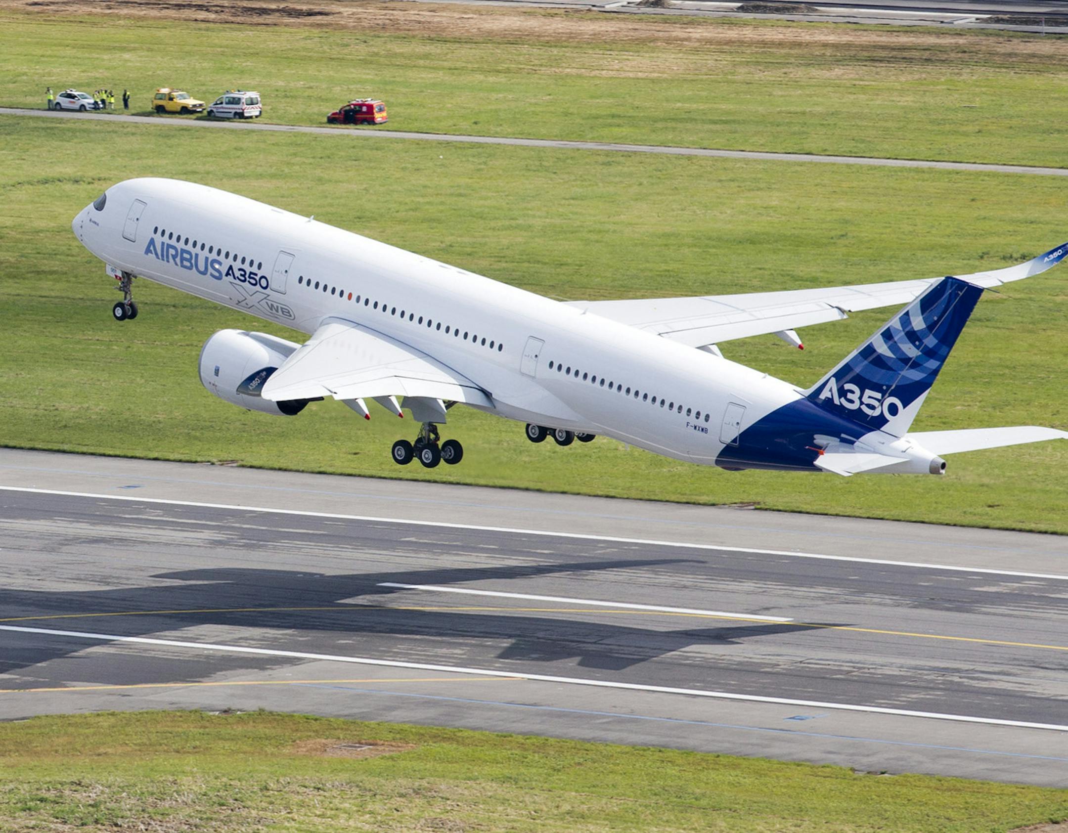 In this photo released by Airbus on Friday, June 14, 2013, the Airbus A350 takes off on its maiden flight at Blagnac airport near Toulouse, southwestern France, Friday, June 14, 2013. The Airbus A350 has taken off on its maiden flight, setting the stage for intensifying competition with U.S. rival Boeing in the long-haul wide-body aircraft market. (AP Photo/Sylvain Ramadier, Airbus) ORG XMIT: MIN2013061406335708