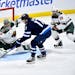 Goalie Marc-Andre Fleury and the Wild weren't as successful Tuesday against Adam Lowry (17) and the rest of the Jets as they'd been against Vancouver 
