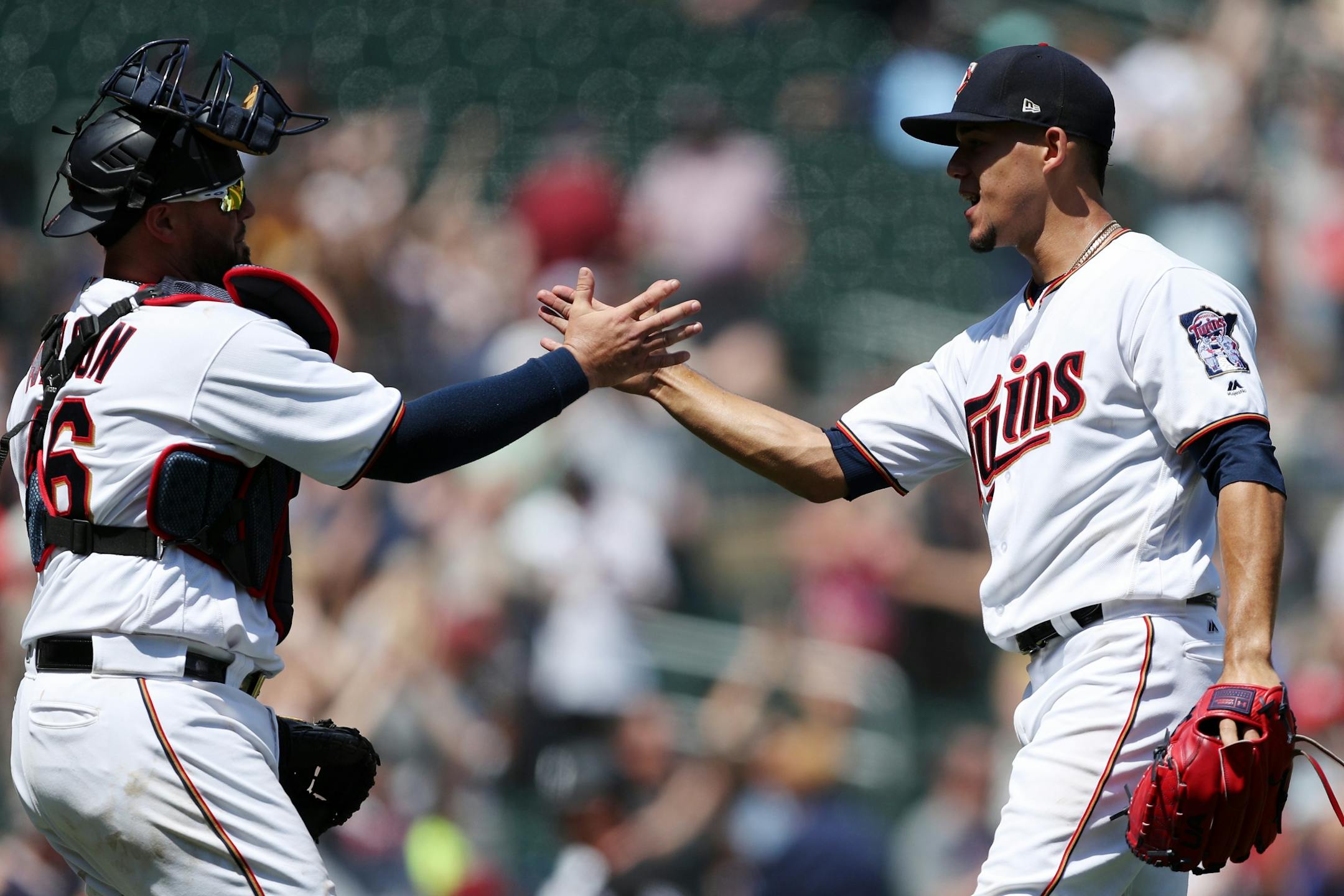 Minnesota Twins starting pitcher Jose Berrios (17) celebrated with Minnesota Twins catcher Bobby Wilson (46) after the win over the Chicago White Sox.
