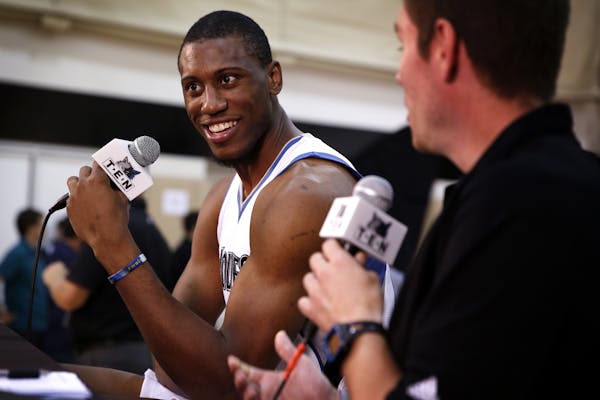 Thaddeus Young does an interview duringTimberwolves media day at the Target Center on Monday, September 29, 2014.