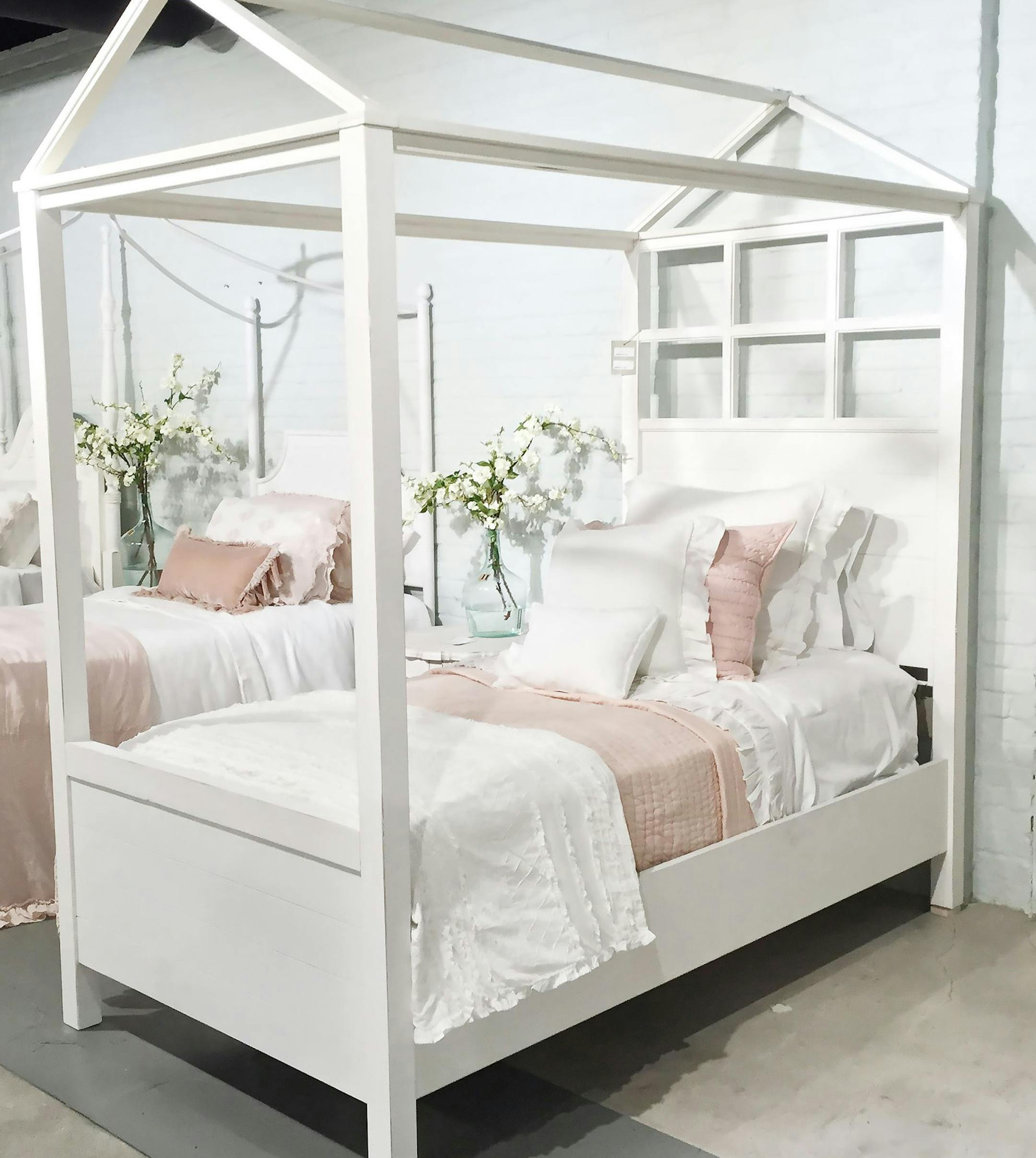 Magnolia Home, the furniture line by Chip and Joanna Gaines of HGTV, includes a Playhouse canopy youth bed that comes in a white or wood finish. (Patricia Sheridan/Pittsburgh Post-Gazette/TNS) ORG XMIT: 1194121