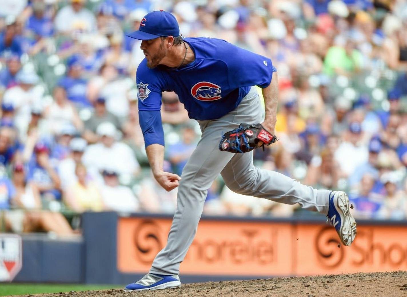 Chicago Cubs pitcher Joe Nathan throws during the sixth inning of a baseball game against the Milwaukee Brewers, Sunday, July 24, 2016, in Milwaukee.