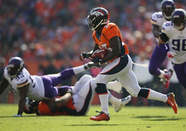 Bronco's Ronnie Hillman goes 72 yards for a touchdown in the first quarter on Sunday against the Vikings.