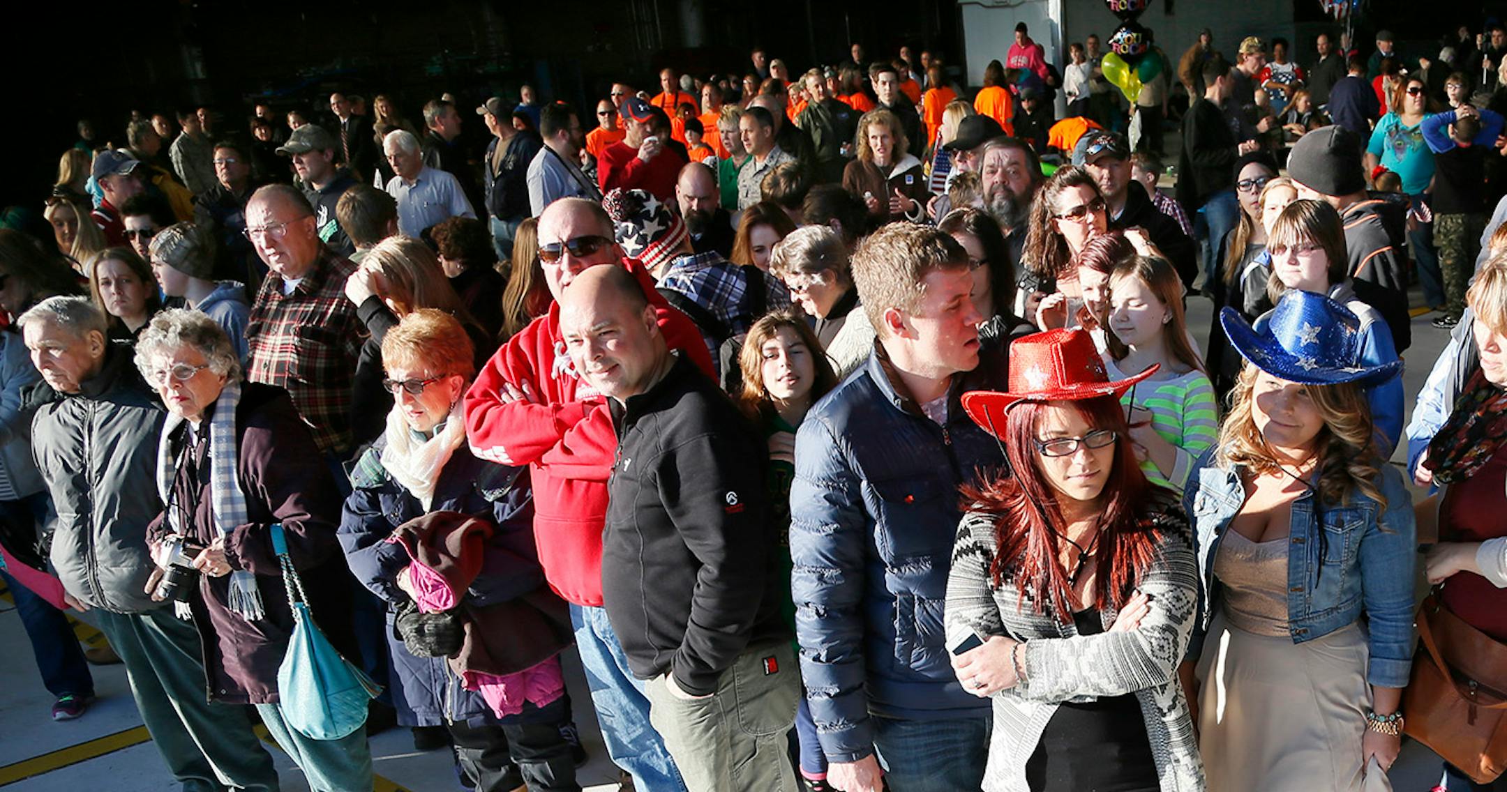 Families gather for the arrival of the more than 100 Airmen and three C-130 H3 Hercules aircraft from the 934th Airlift Wing, Air Force Reserve, return from their deployment to Southwest Asia after their four-month tour of duty. Sunday January 18, 2015 Minneapolis, MN.] Jerry Holt/ Jerry.Holt@Startribune.com