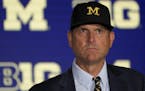 Michigan head coach Jim Harbaugh listens to a question during the Big Ten Conference NCAA college football media days Friday, July 19, 2019, in Chicag