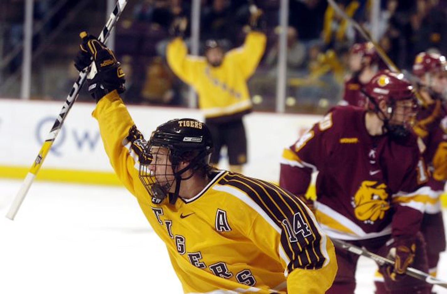 2008: Colorado College center Chad Rau (14) celebrates his assist on a teammate's goal.