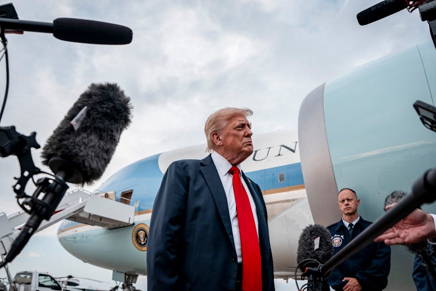 President Donald Trump speaks to reporters at Joint Base Andrews in Maryland on Sunday, July 13, 2025, after attending the FIFA Club World Cup final in New Jersey. The fallout of the Epstein case is testing the power the president holds over his most loyal followers, many of whom have broken into open revolt against him. (Haiyun Jiang/The New York Times)