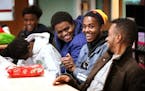 Abdinur Omar, second from right, 18, laughed during a youth discussion group about cross cultural connections.