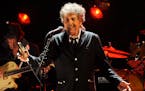 In this Jan. 12, 2012, file photo, Bob Dylan performs in Los Angeles.