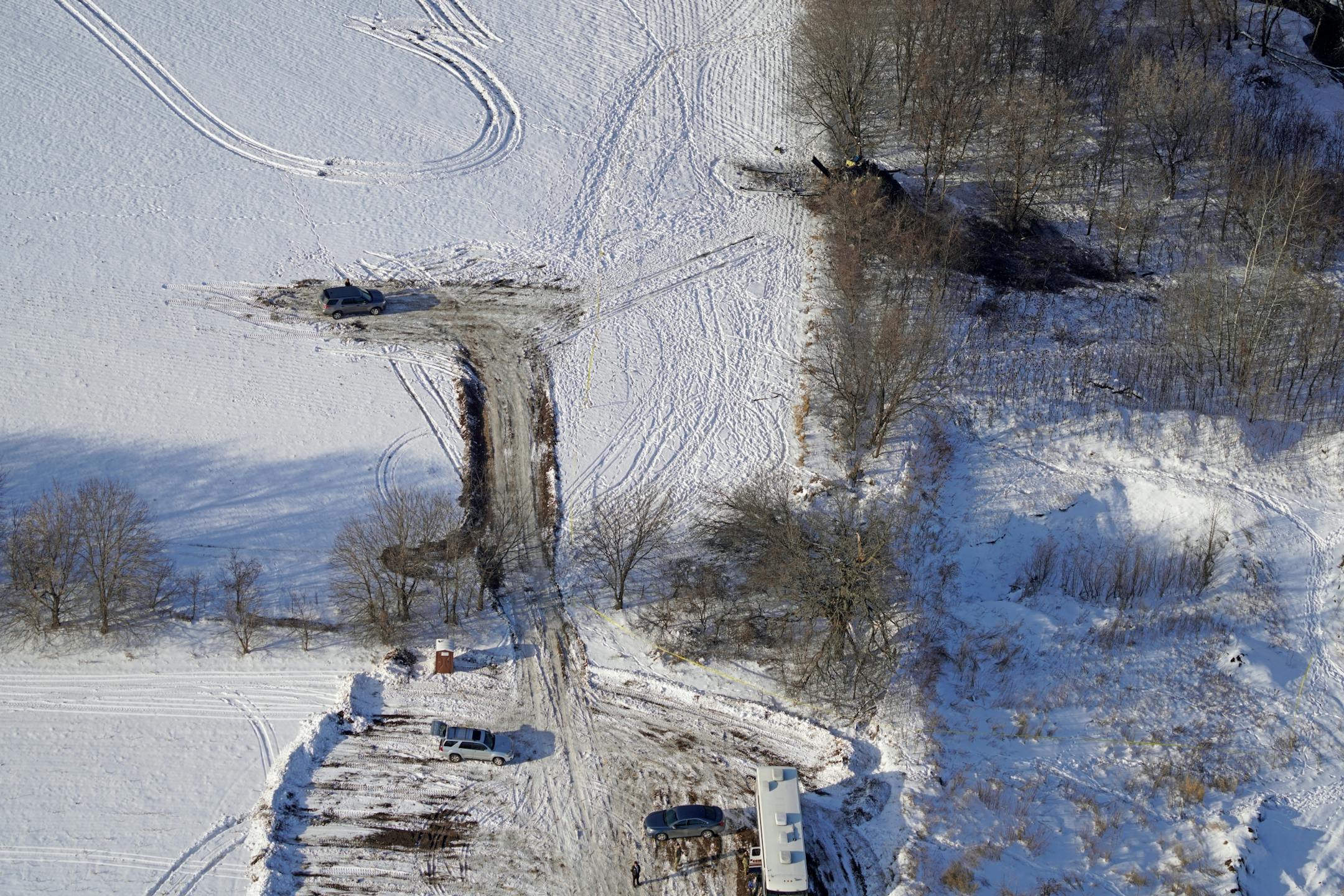 The crash site of a Minnesota National Guard Black Hawk helicopter that killed three service members Thursday afternoon was found in the trees on the edge of a farm field southwest of Marty, Minn.