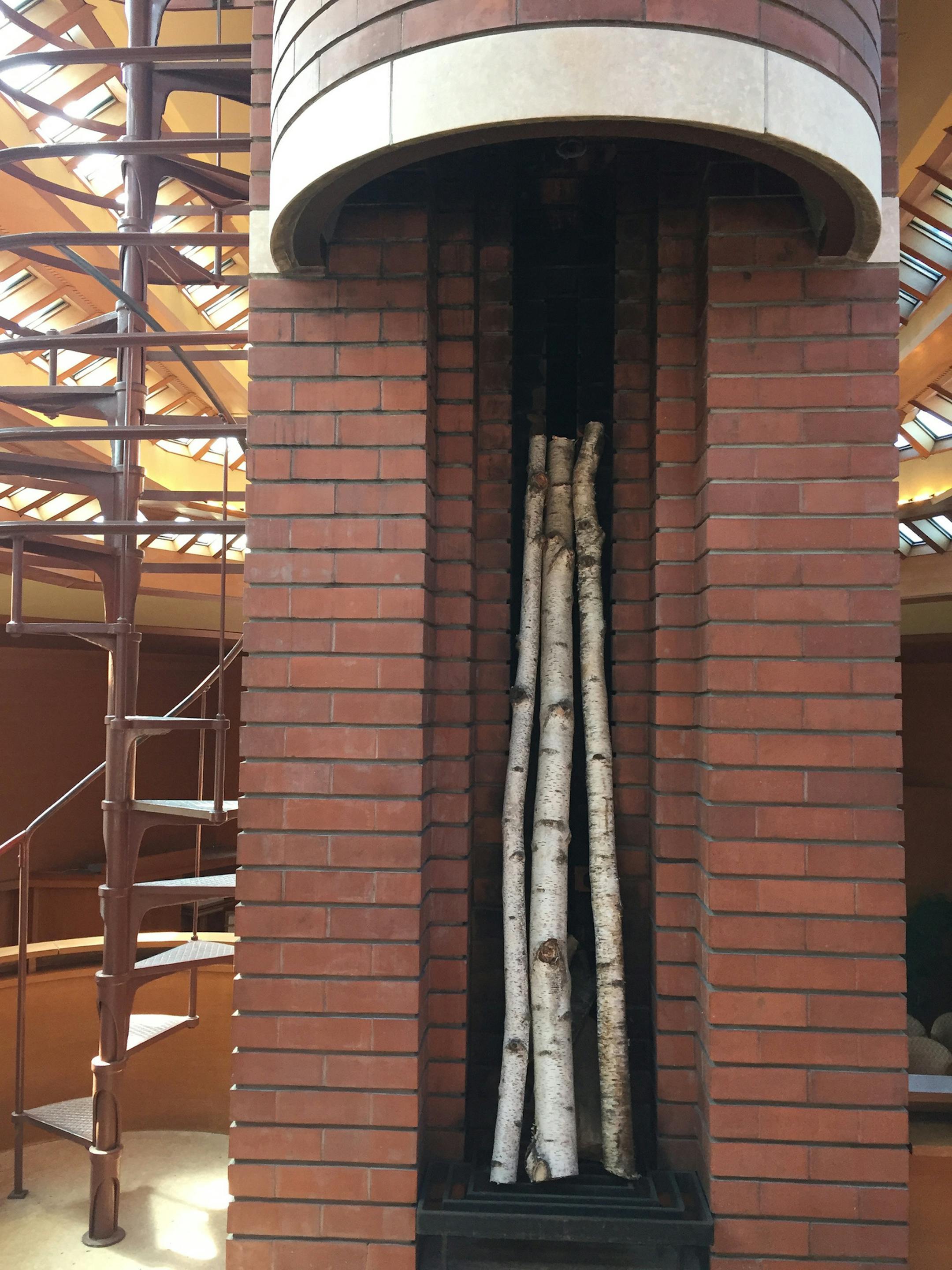 A vertical fireplace at Wingspread, where the logs burned at the bottom.