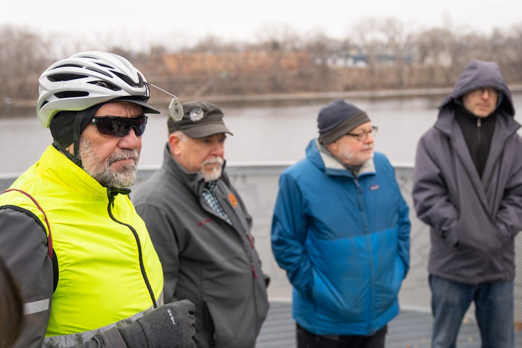 Dan Miller, a cycling activist for the construction of a new pedestrian bridge across the Mississippi River, listened during a site visit and Q&A.