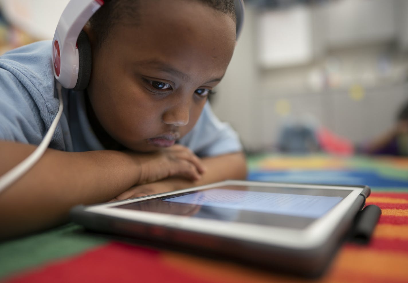 Sudais Omar, a student at Galtier Community School, one of the winning schools, read as part of the "Read to the Final Four."