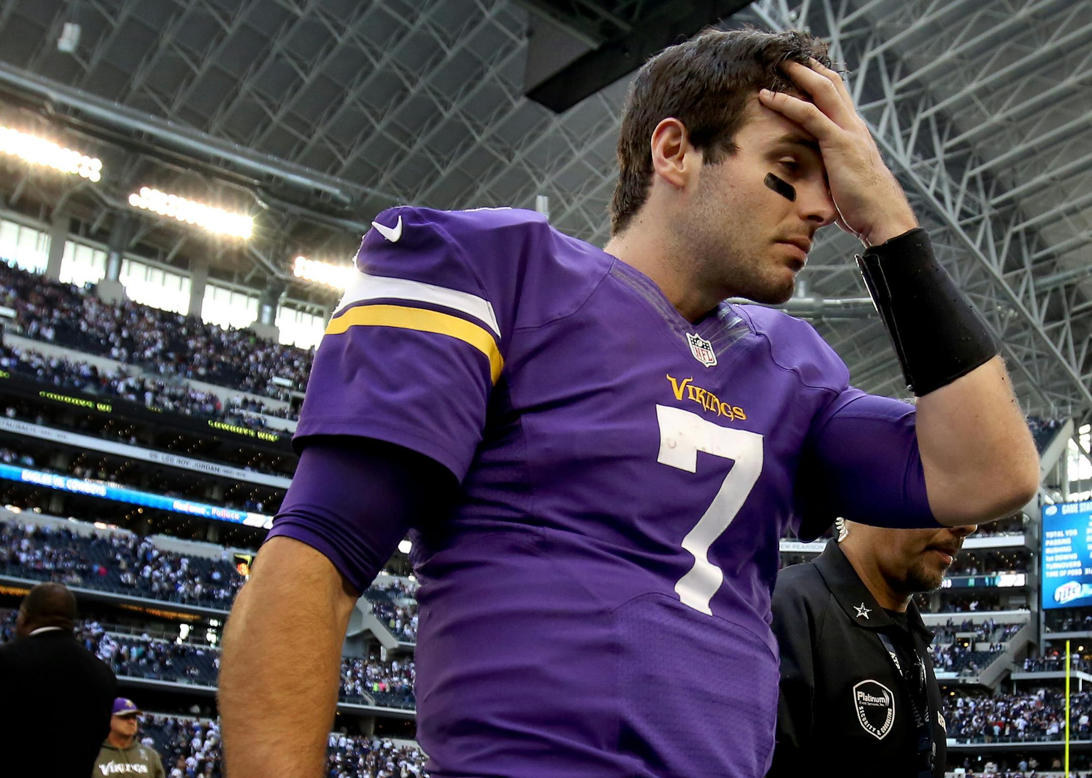 Vikings quarterback Christian Ponder walked off the field at the end of the 27-23 loss to Dallas.