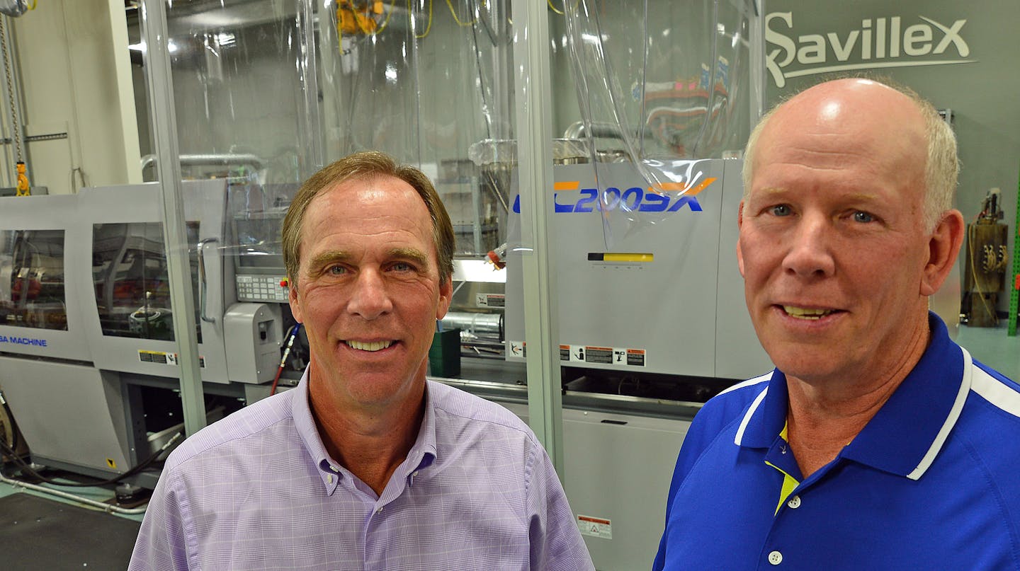 Terry Nagel and Mike Osgar, are owners of Eden Prairie-based Savillex Corp., one of few companies in the world that manufacturers fluoropolymer lab equipment and custom products used by researchers in more than 60 countries, recently received a 2013 Presidential "E" Award from the U.S. Department of Commerce for its export success.] Richard.Sennott@startribune.com Richard Sennott/Star Tribune Eden Prairie , Minnesota Thursday 7/01/13) ** (cq)