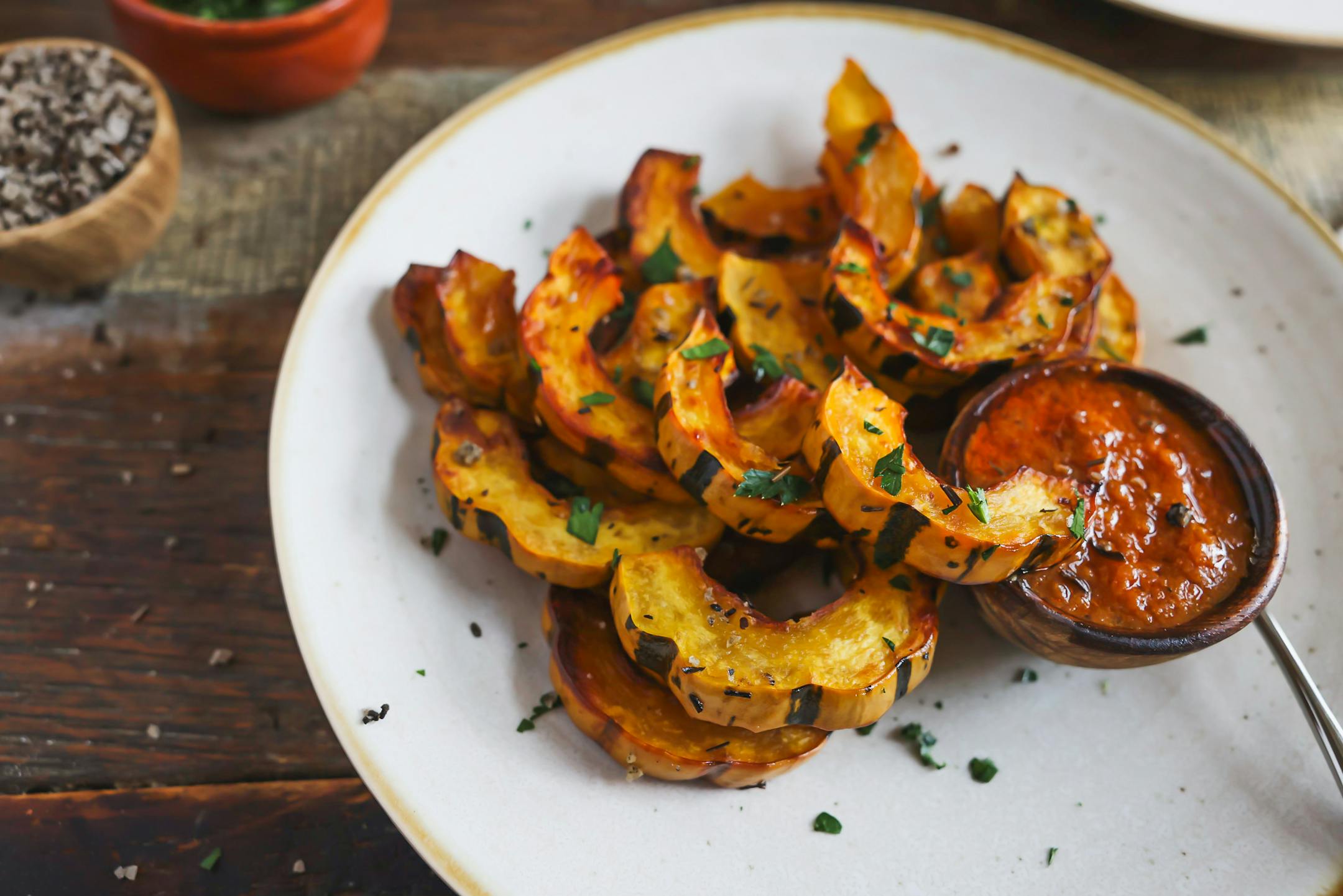 Roast Delicata with Red Pepper Dipping Sauce can be the centerpiece of an appetizer, salad or side dish. Recipe by Beth Dooley, photo by Ashley Moyna Schwickert, Special to the Star Tribune