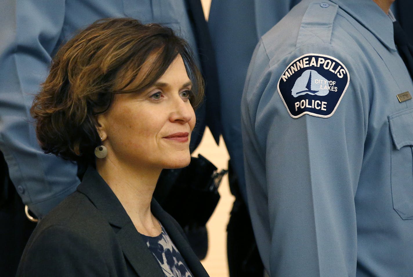 Minneapolis Mayor Betsy Hodges posed for photos during the Minneapolis Police officer's graduation ceremony of the 2015 Recruit/Lateral Class at St. Mary's Greek Orthodox Church. ] CARLOS GONZALEZ &#xef; cgonzalez@startribune.com - December 17, 2015, Minneapolis, MN, St. Mary's Greek Orthodox Church, Minneapolis Mayor Betsy Hodges, Hodges attends police graduation ceremony.