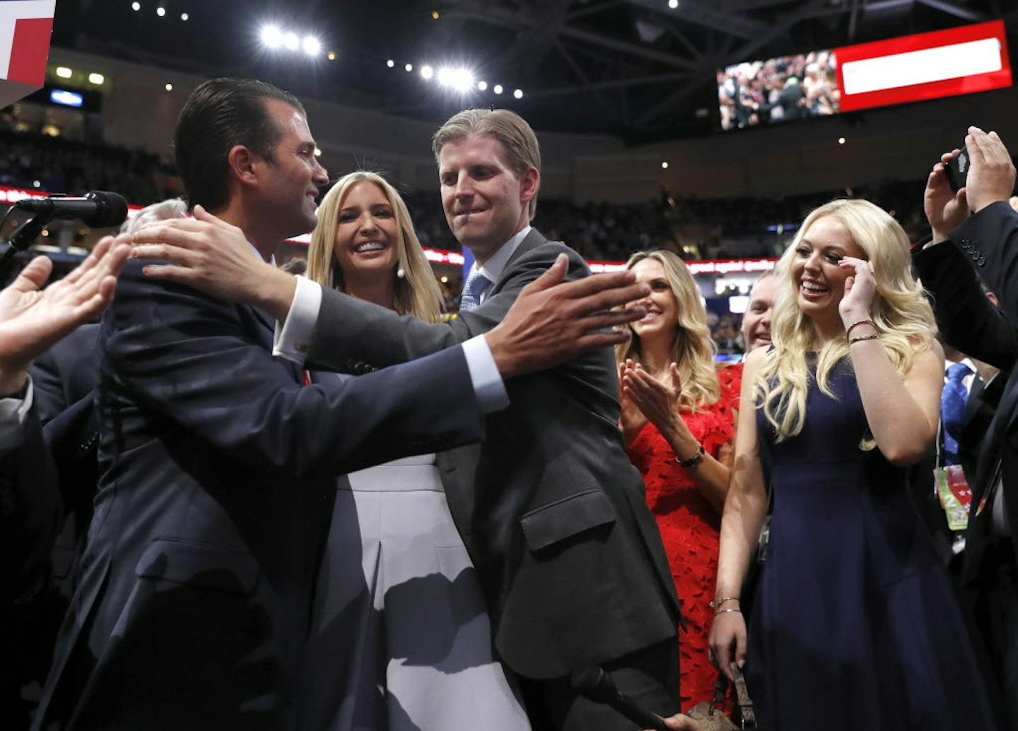 Republican Presidential Candidate Donald Trump's children Donald Trump, Jr., Ivanka Trump, Eric Trump and Tiffany Trump celebrate on the convention floor during the second day session of the Republican National Convention in Cleveland, Tuesday, July 19, 2016.