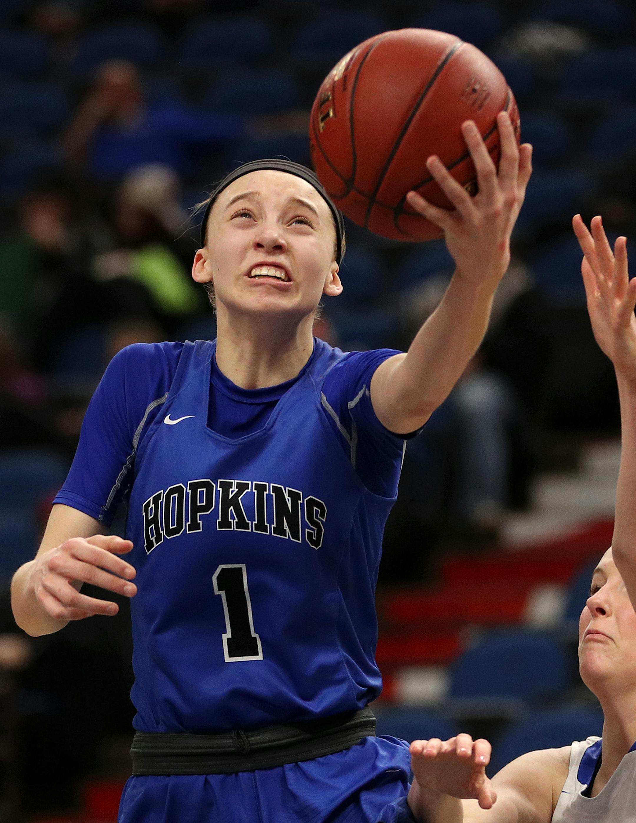 Hopkins' Paige Bueckers (1) went up for a shot as Minnetonka's Erin Shoemaker (11) reached to defend in the second half. ] ANTHONY SOUFFLE ï anthony.souffle@startribune.com Players competed during the girls' basketball state tournament Class 4A quarterfinal games Tuesday, March 14, 2017 at the Target Center in Minneapolis.