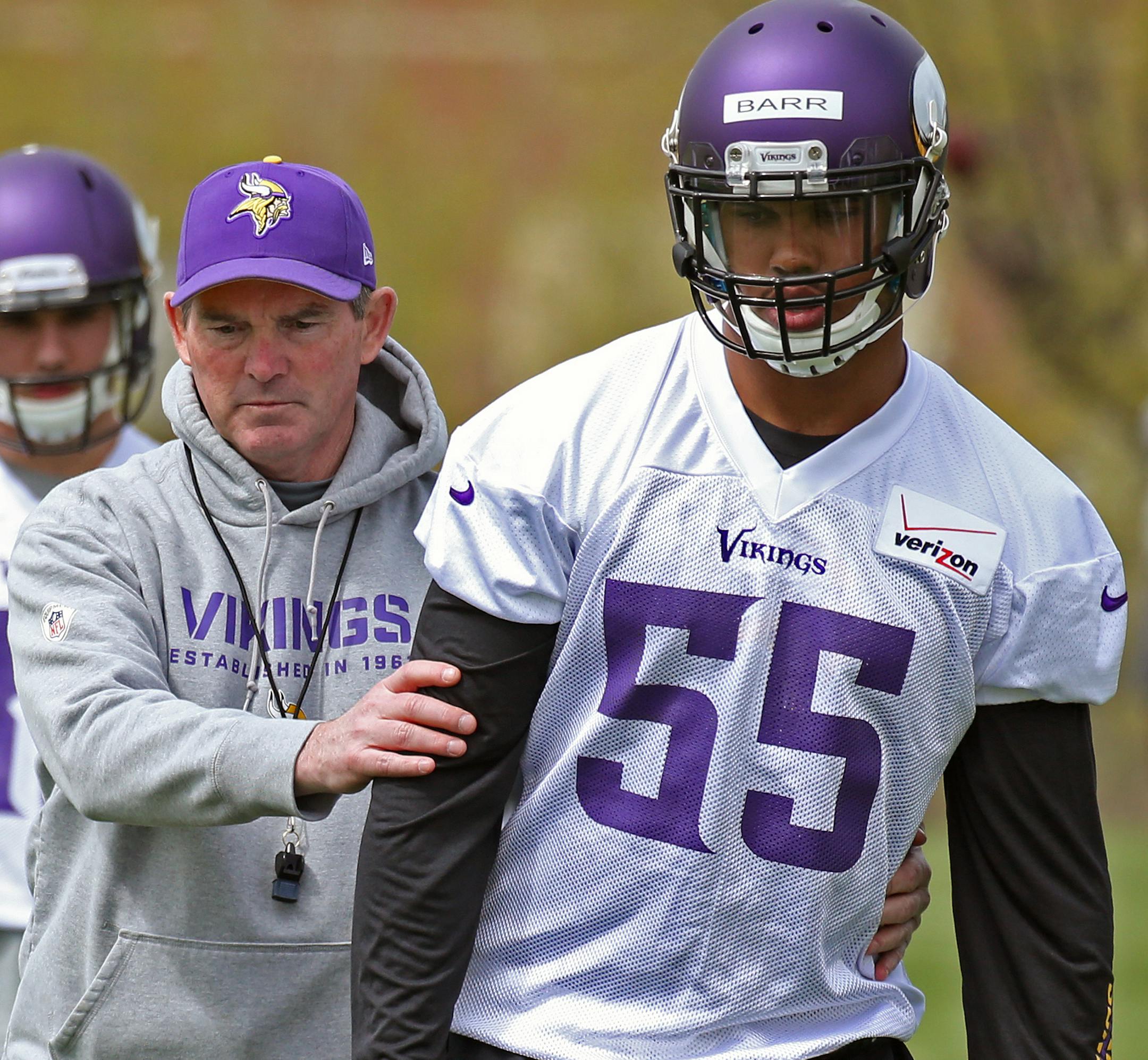 (left to right) Minnesota Vikings Head Coach Mike Zimmer positioned linebacker Anthony Barr during the Vikings Rookie Mini Camp at Winter Park on 5/16/14.] Bruce Bisping/Star Tribune bbisping@startribune.com Mike Zimmer, Anthony Barr/roster.