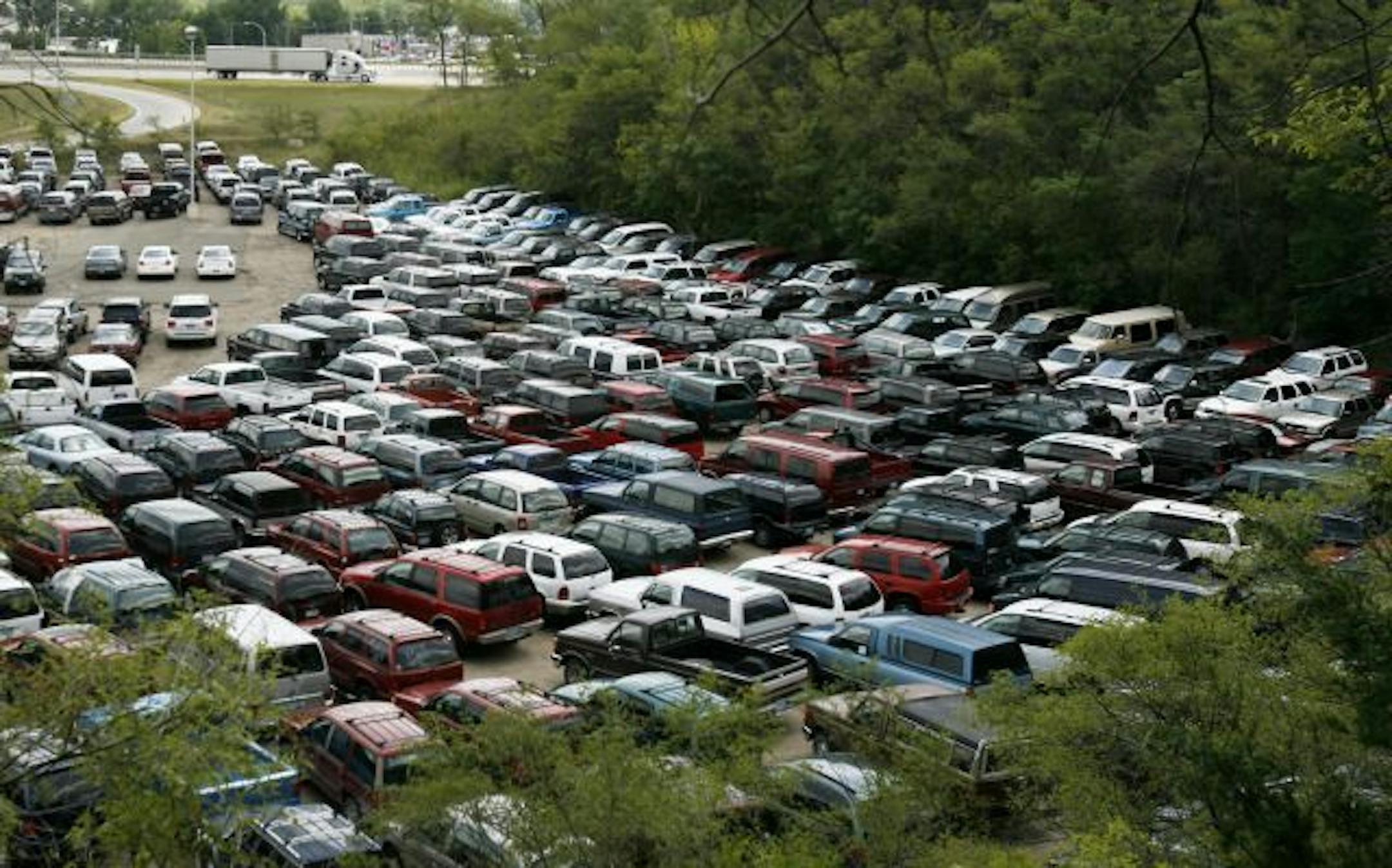 Walser's used-car lot in South St. Paul was packed Friday with vehicles traded in on the CARS program. Walser said that, of about 700 cars sold through the program, not one rebate has yet been approved.
