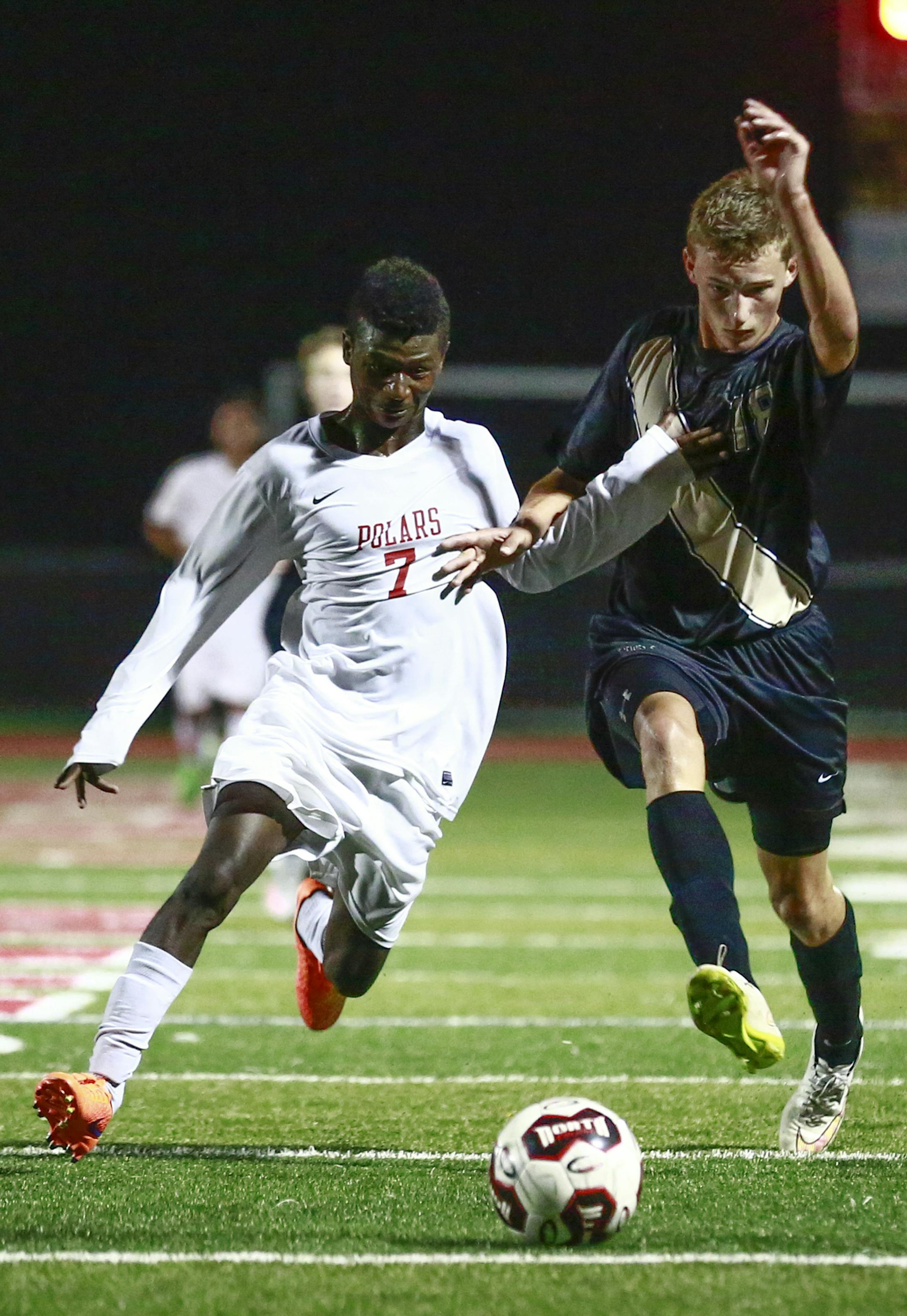 Ata Claremond, North St. Paul soccer, #7 in white