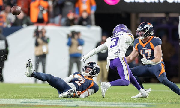 Broncos cornerback Pat Surtain II (2) breaks up a pass intended for Vikings wide receiver Jordan Addison (3) in the fourth quarter.