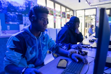 Mekhia Lutgen and Donte Wilson work on projects during a computer science principles class at the Career and Technical Education center at North High 