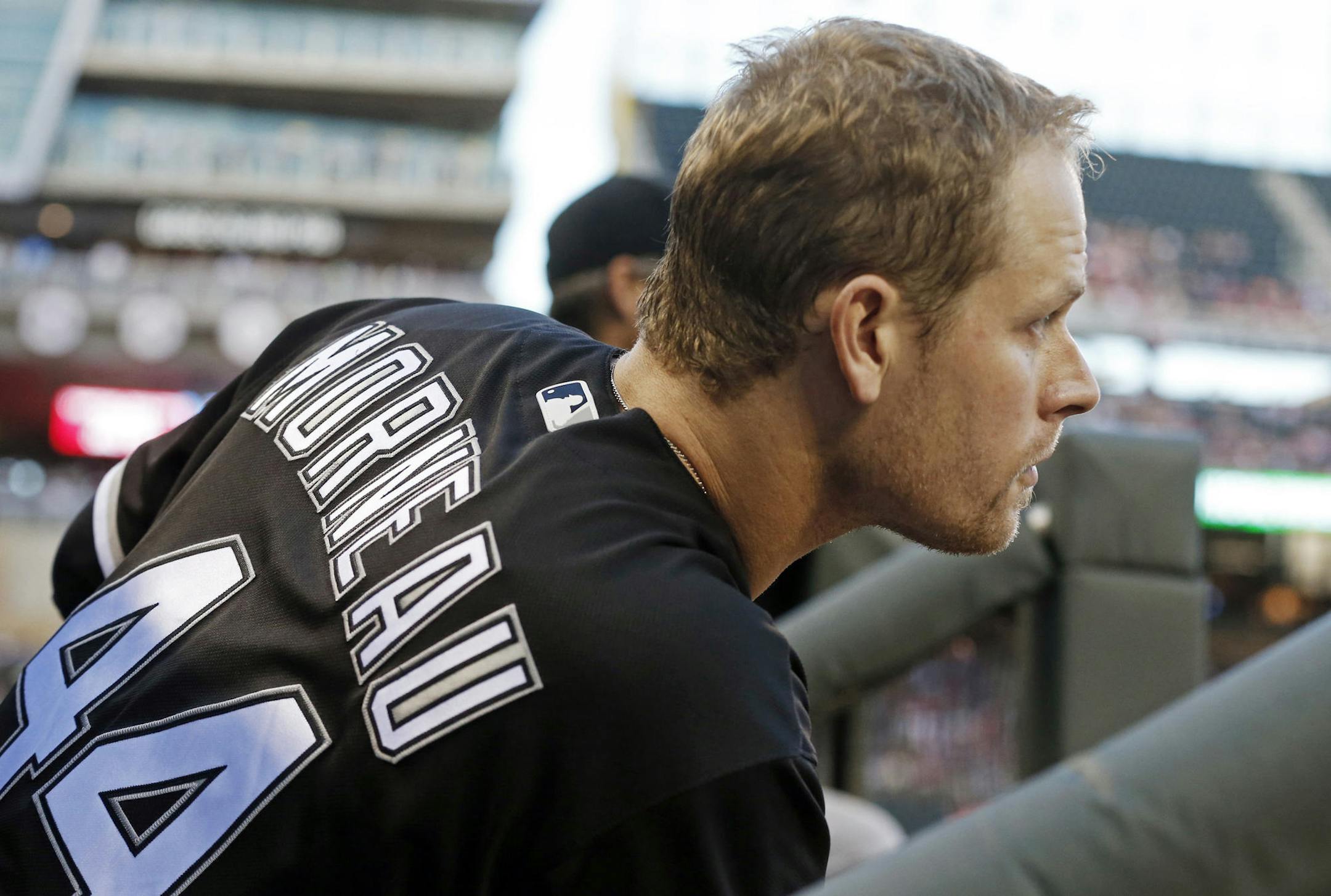Former Minnesota Twins player Justin Morneau waits to bat in the fourth inning during his return to Target Field as a Chicago White Sox designated hitter in a baseball game against the Twins, Friday, July 29, 2016, in Minneapolis. (AP Photo/Jim Mone)