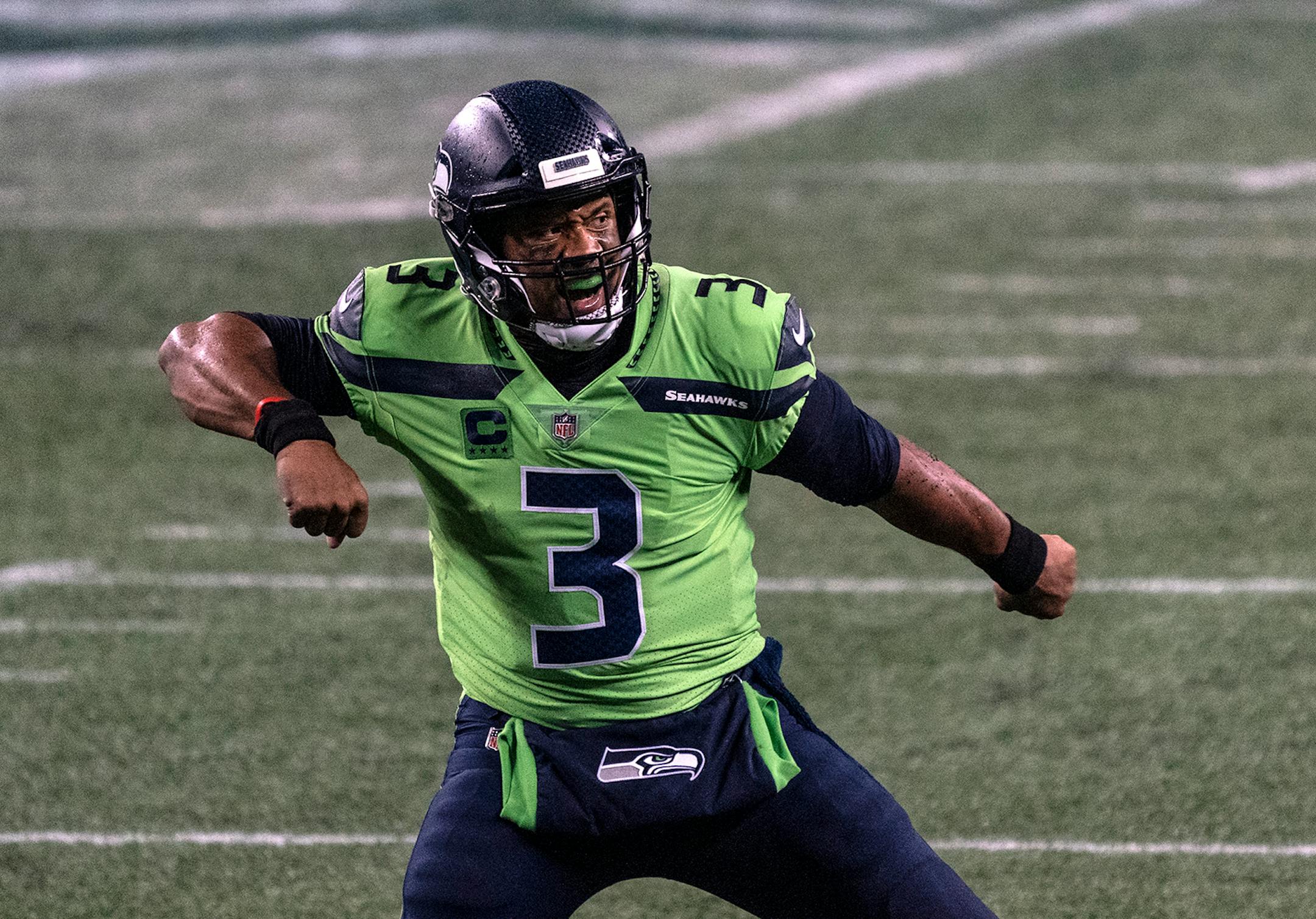 Seattle Seahawks quarterback Russell Wilson reacts after throwing the game winning touchdown during the second half an NFL football game against the Minnesota Vikings, Sunday, Oct. 11, 2020, in Seattle. The Seahawks won 27-26. (AP Photo/Stephen Brashear) ORG XMIT: NYOTK