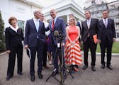 President Joe Biden with senators in June after the bipartisan group reached a deal on infrastructure spending. The measure is stuck in the House.