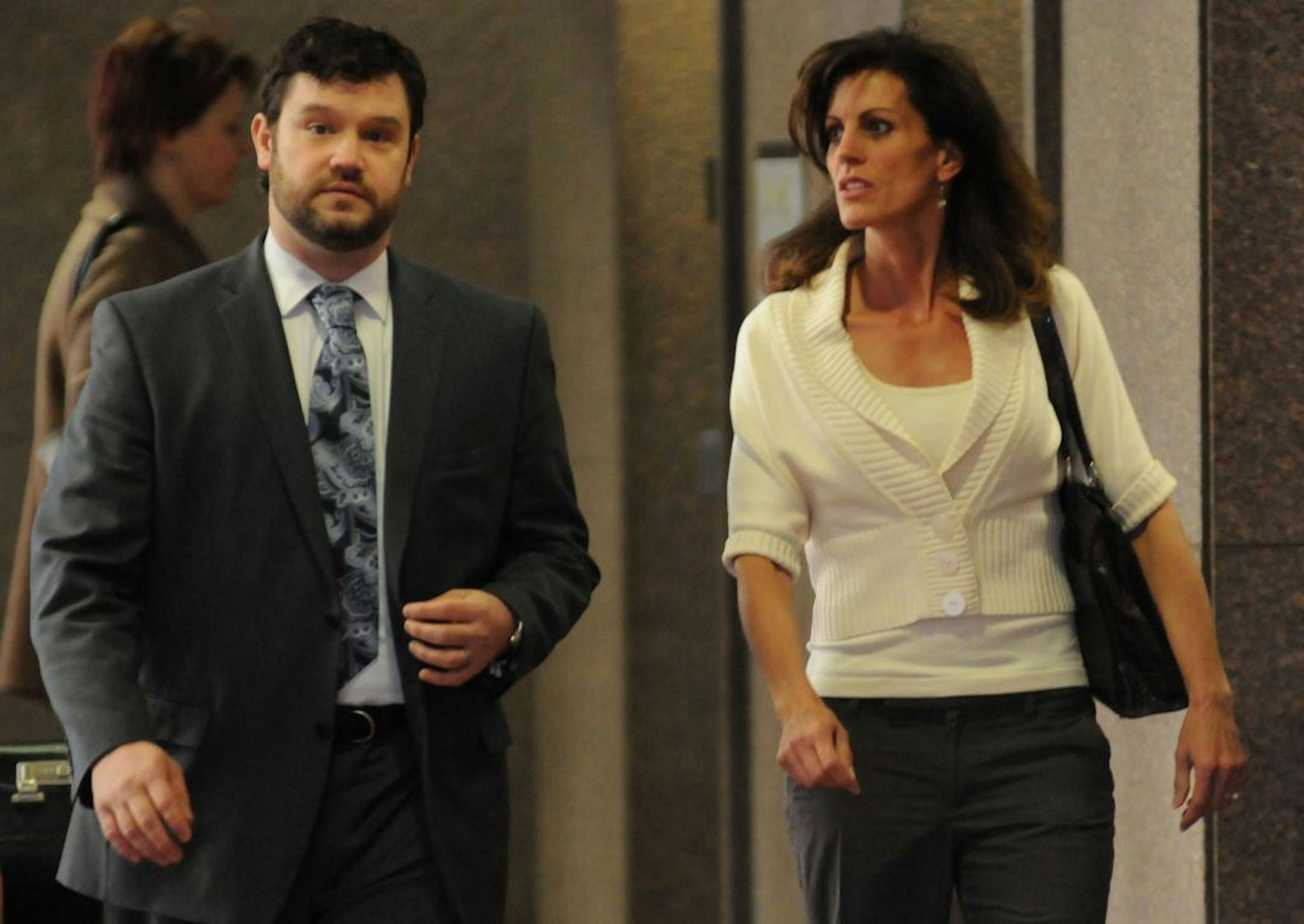 Amy Senser walked with her attorney Eric Nelson in the Hennepin County Government Center on Thursday morning April 26, 2012 . Amy Senser is charged with felony criminal vehicular homicide in the Aug. 23, 2011, death of Anousone Phanthavong, whom she struck and killed as he filled his car with gas on the Interstate 94 ramp at Riverside Avenue just east of downtown Minneapolis. Hennepin County Government Center.