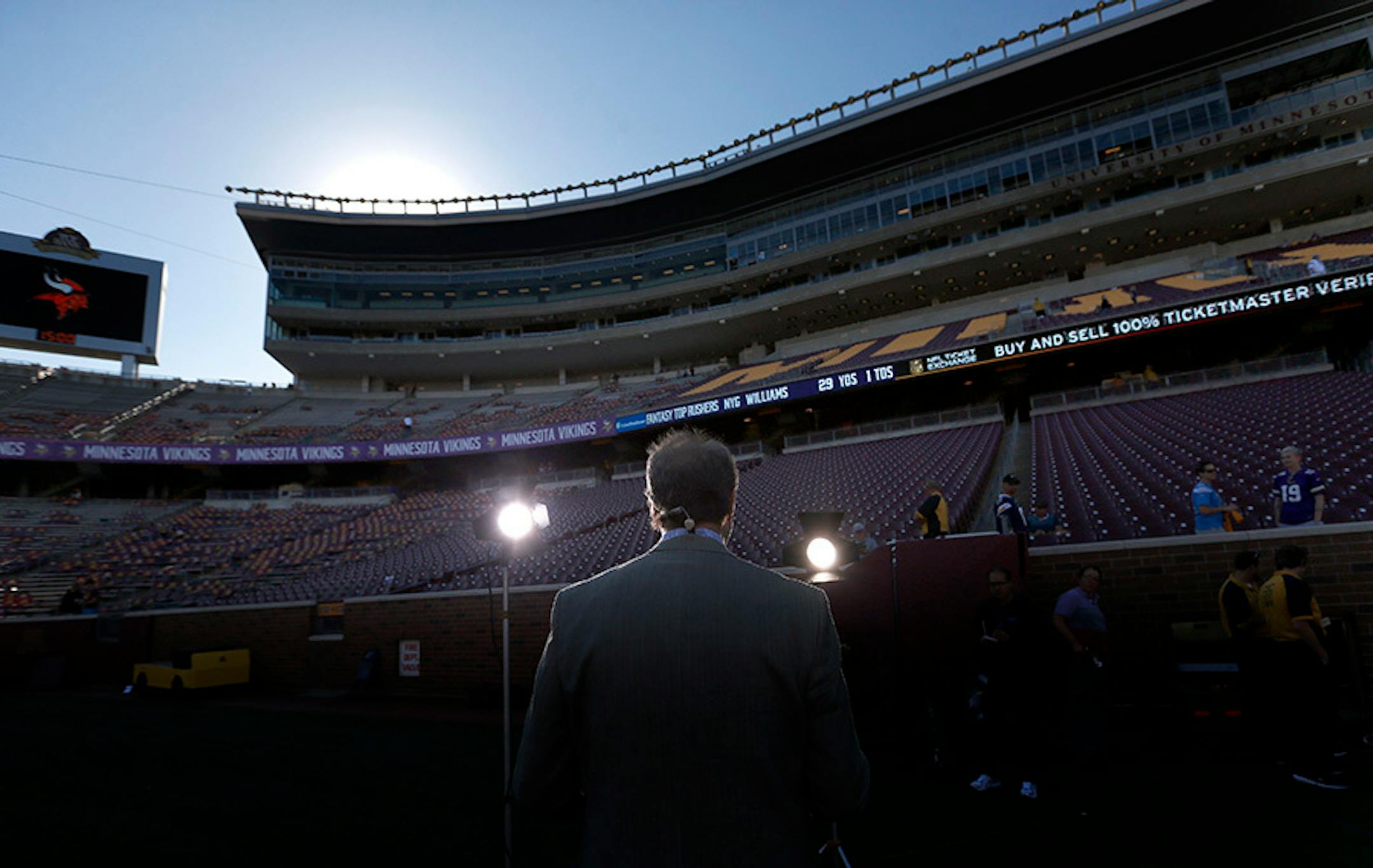 WCCO sports director Mark Rosen prepared for a pregame broadcast from the sidelines of TCF Bank Stadium before the Vikings vs. Lions game.