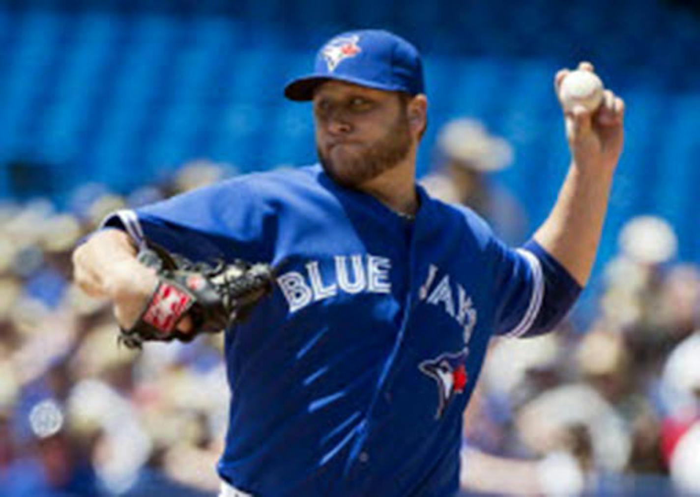 Blue Jays starter Mark Buehrle pitched eight strong innings to win his 10th game of the season, a 4-0 victory over Kansas City on Sunday.