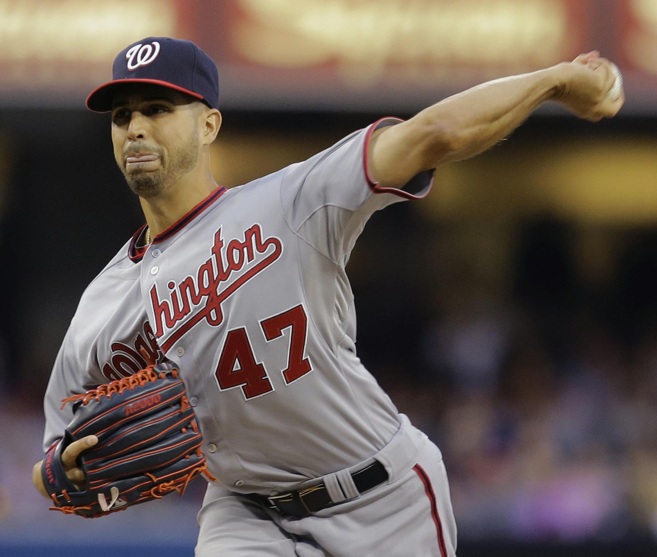 Washington Nationals starting pitcher Gio Gonzalez works against the San Diego Padres in the first inning of a baseball game in San Diego, Friday, May 17, 2013. (AP Photo/Lenny Ignelzi) ORG XMIT: MIN2013060620525210