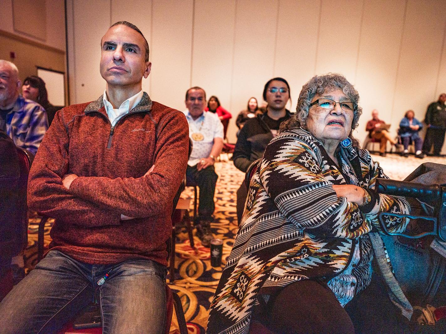 Professor Anton Treuer who led the workshop and native Ojibwe speaker Brenda Moose go through a spell check of text with other participants.