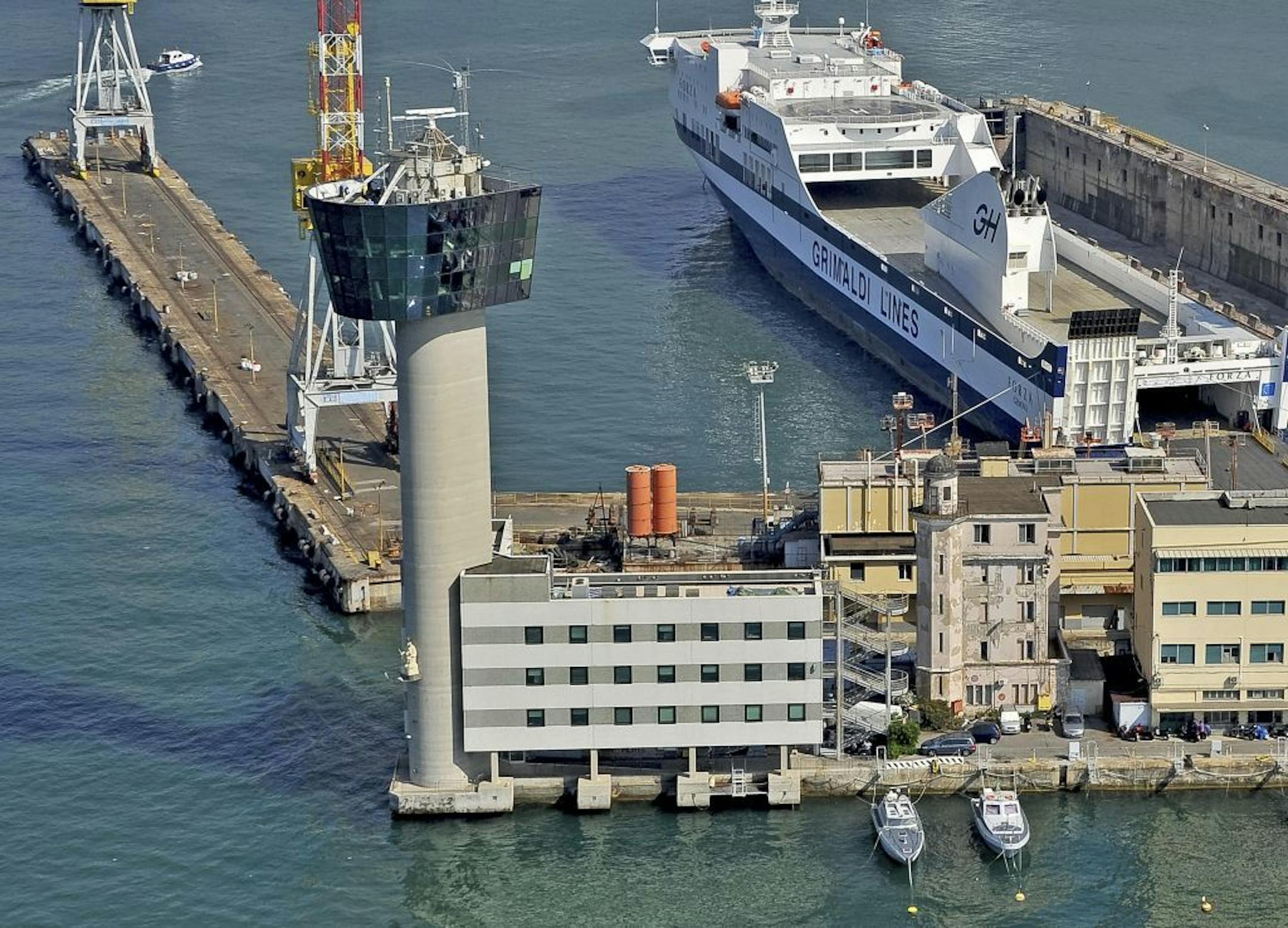 This undated photo made available Wednesday, May 8, 2013, shows the control tower of the port of Genoa, northern Italy, that collapsed after a cargo ship slammed into it killing at least five people, late Tuesday, May 7, 2013. A cargo ship identified as the Jolly Nero of the Ignazio Messina & C. SpA Italian shipping line slammed into the port.