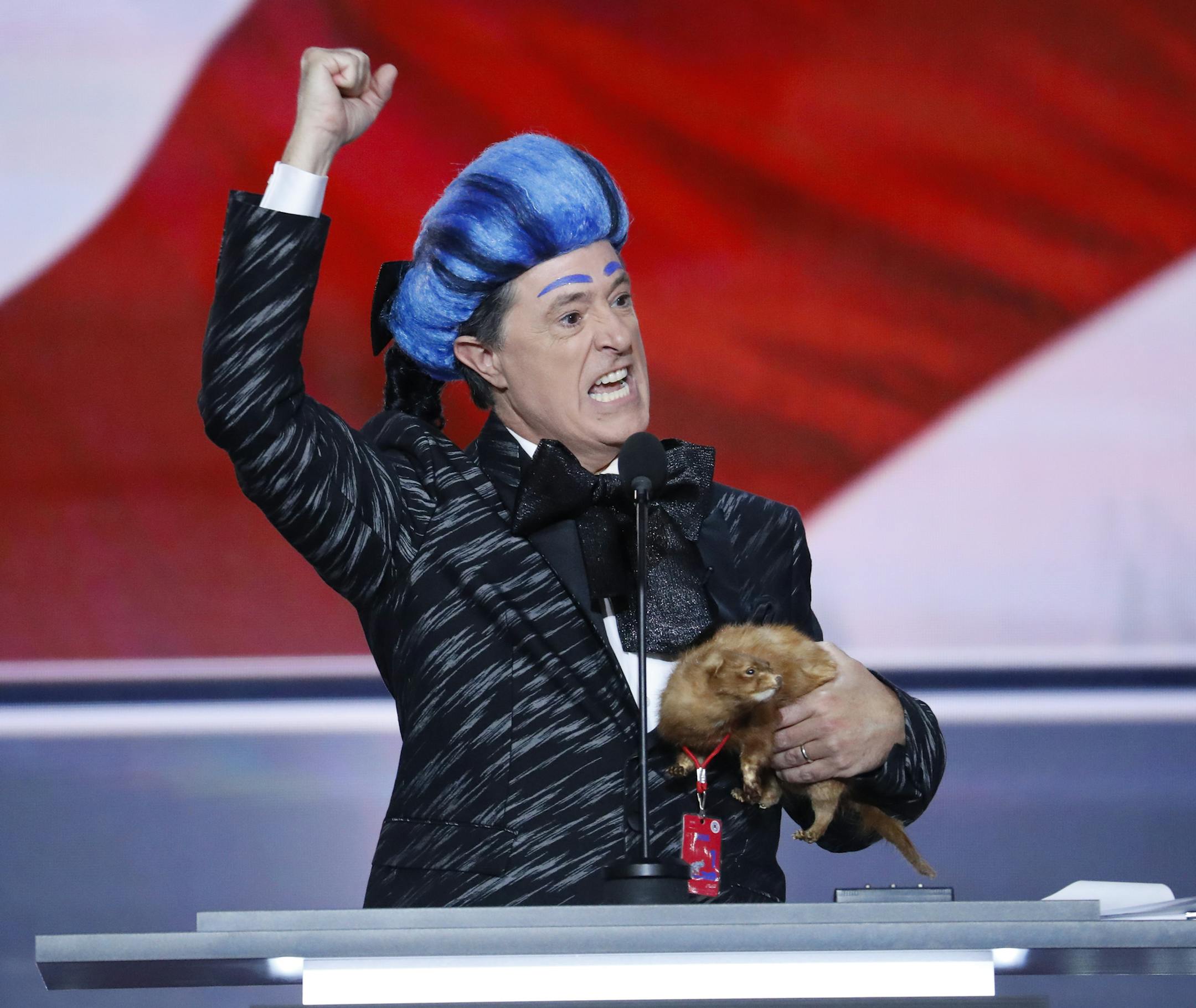 Comedian Stephen Colbert clowns around on the stage at the Republican National Convention in Cleveland, Sunday, July 17, 2016. (AP Photo/J. Scott Applewhite) ORG XMIT: MIN2016072015151243