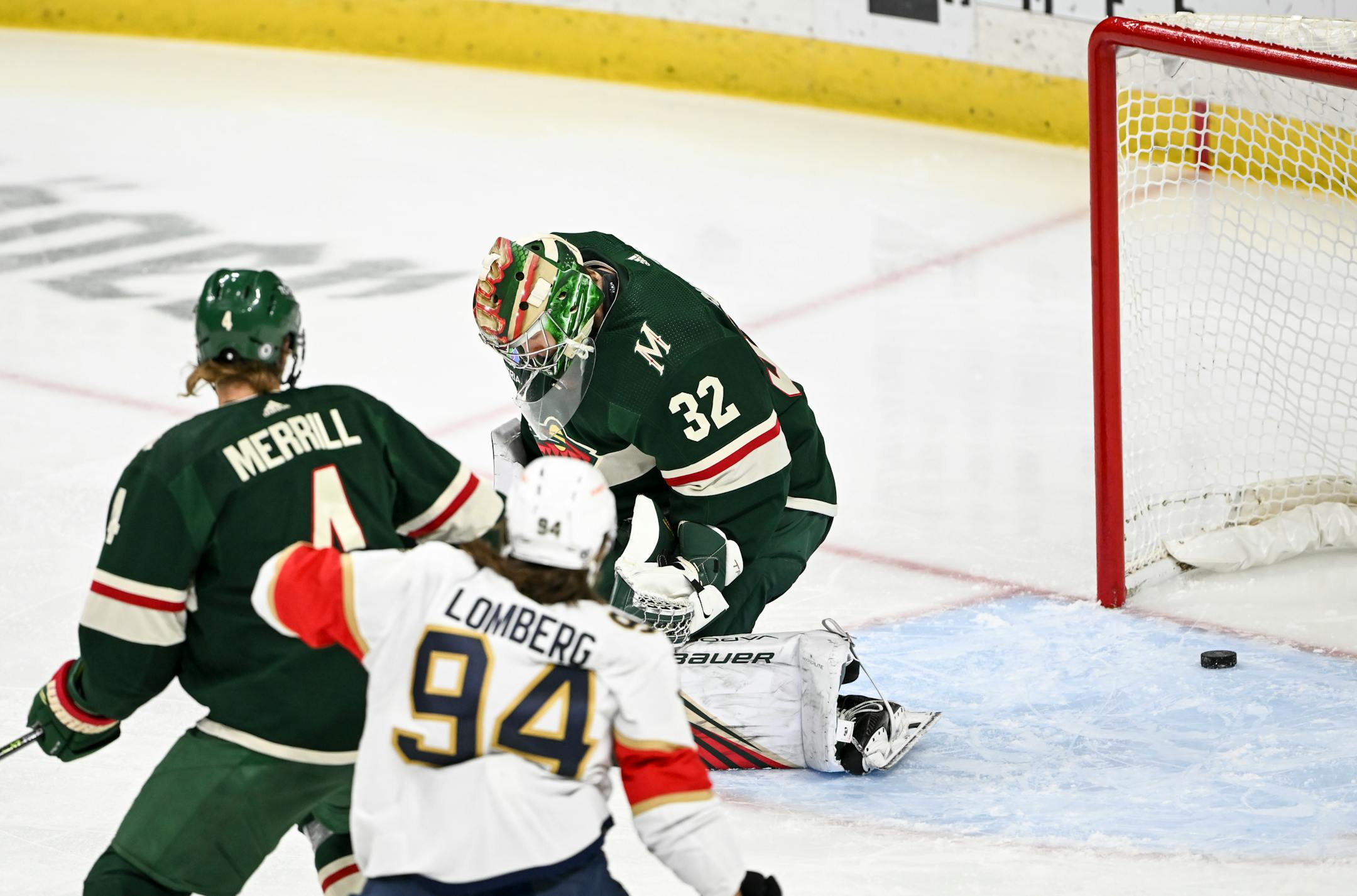 Florida Panthers center Eetu Luostarinen (27) scores a goal against Minnesota Wild goaltender Filip Gustavsson (32) during the second period.