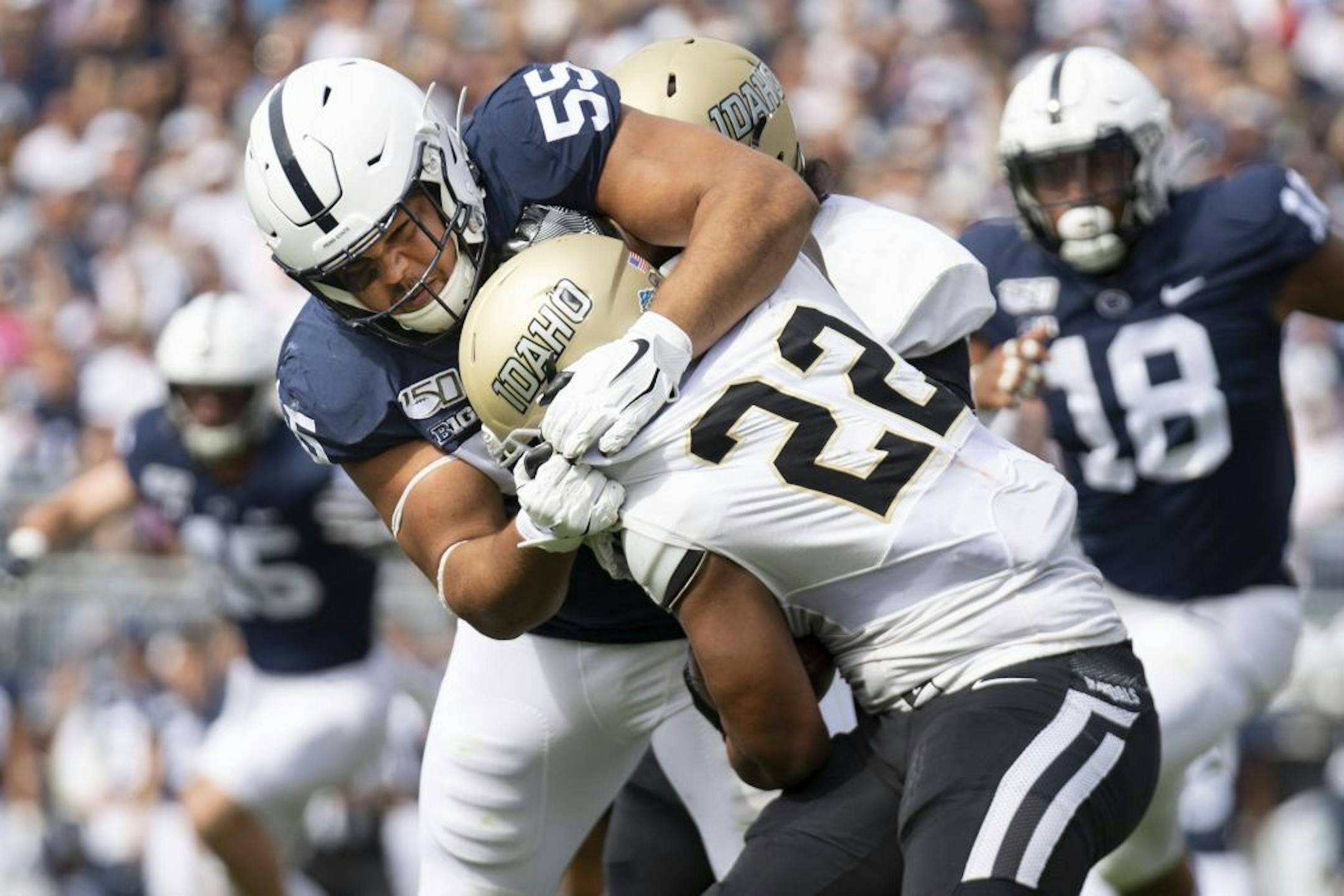 Penn State defensive tackle Antonio Shelton (55) tackles Idaho running back Aundre Carter (22) in the first quarter of a game in August. Shelton has been suspended for the Penn State-Minnesota game on Nov. 9.