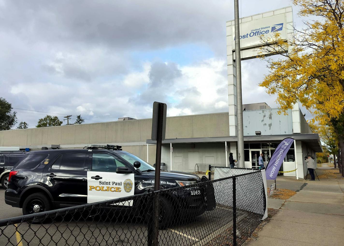 A police vehicle is parked outside of a United States Postal Service office, located at 1715 Seventh Street West in St. Paul, on Sunday, Oct. 13, 2024. ] NICOLE NORFLEET • nicole.norfleet@startribune.com