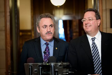 Vikings owner Zygi Wilf (left) and team vice president Lester Bagley.