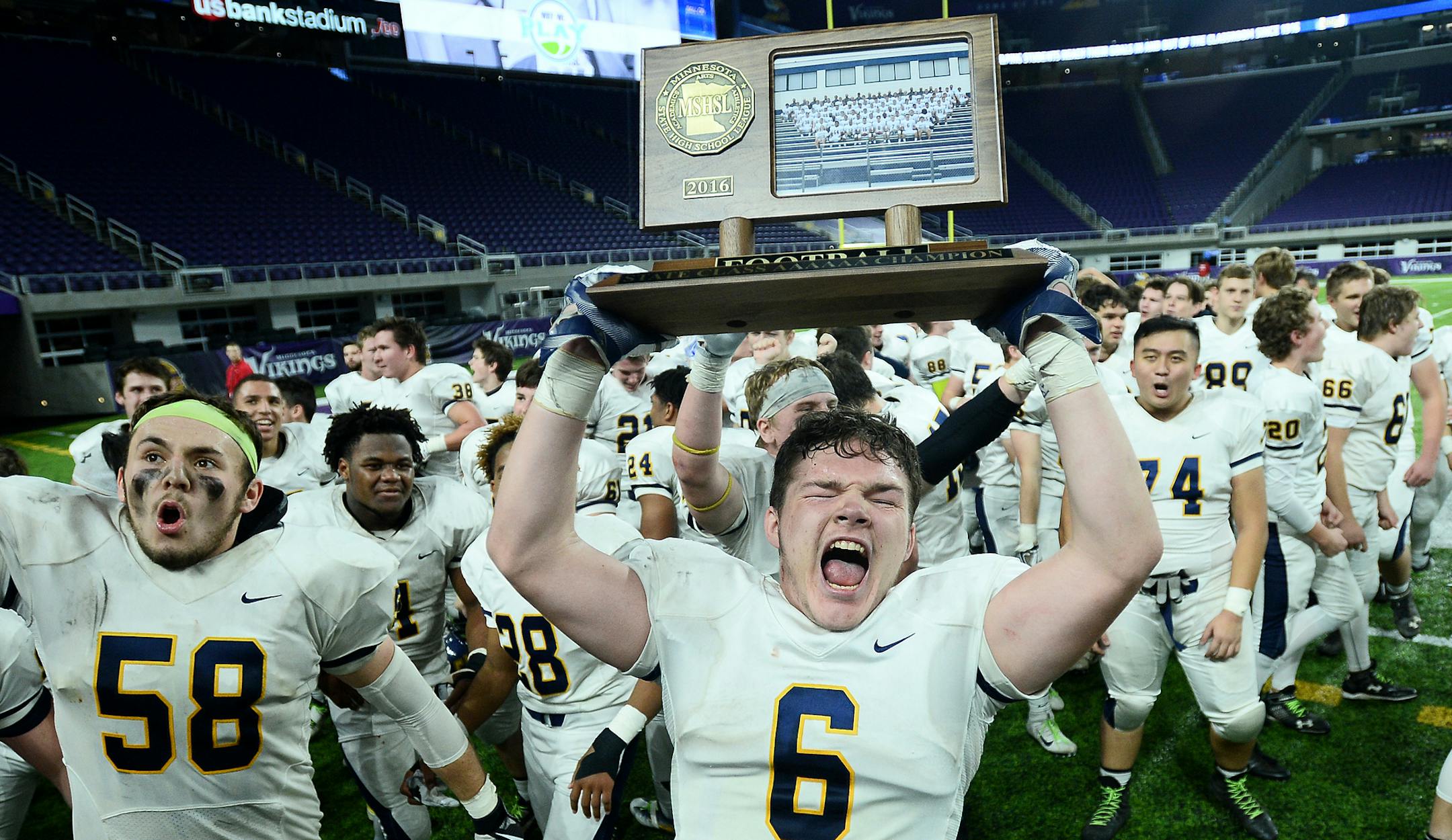 Totino Grace fullback Brady Bertram ( 6) celebrated with his team's 6A championship victory after defeating Eden Prairie Friday night. ] (AARON LAVINSKY/STAR TRIBUNE) aaron.lavinsky@startribune.com Eden Prairie played Totino Grace in the Class 6A Championship Game of the the Prep Bowl on Friday, Nov. 25, 2016 at U.S. Bank Stadium in Minneapolis, Minn.