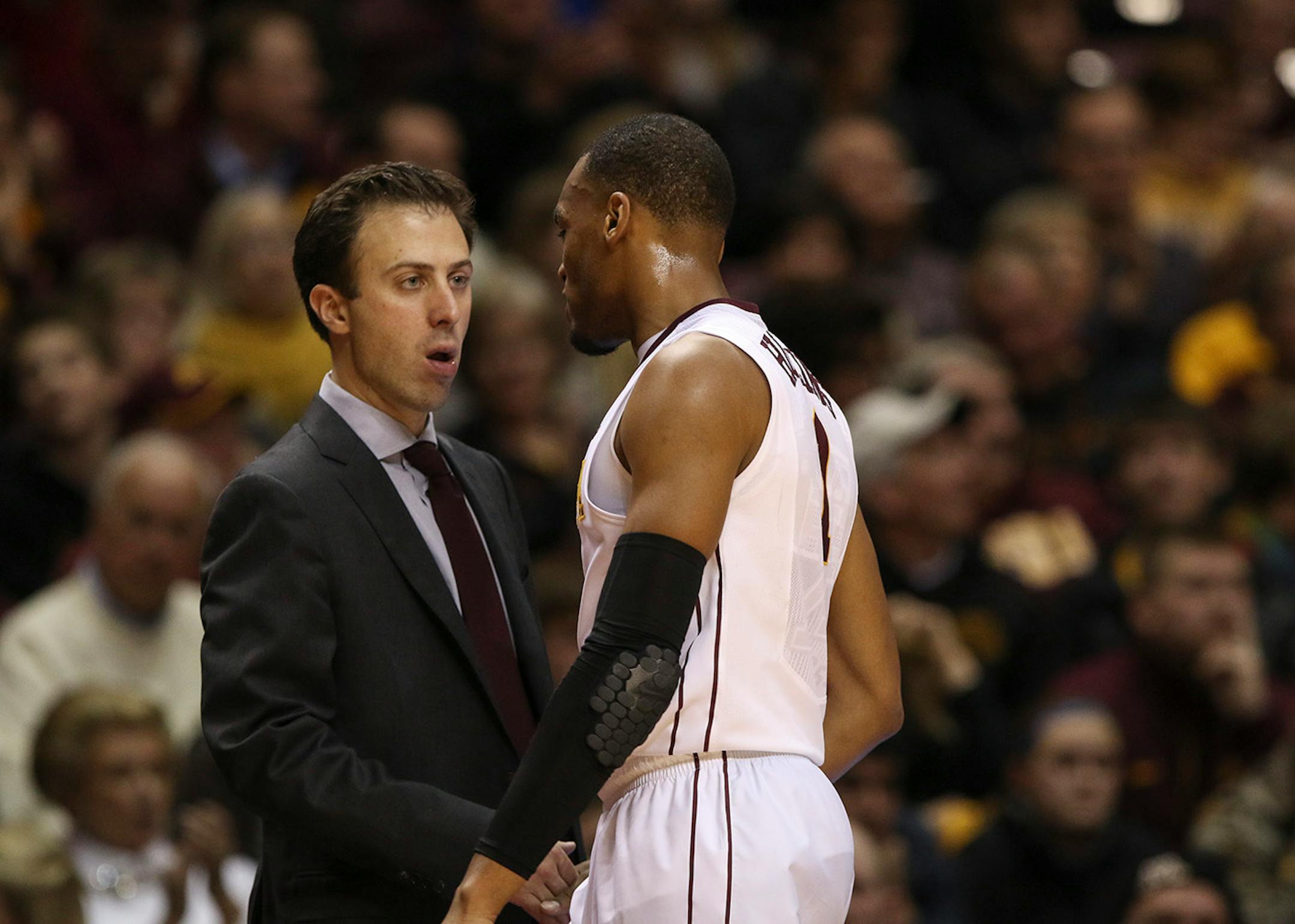 Gophers head coach Richard Pitino spoke with Gophers guard Andre Hollins as he came off the court in the second half Wednesday night at Williams Arena. ] JEFF WHEELER • jeff.wheeler@startribune.com The University of Minnesota men's basketball team trounced Southern University 85-57 at Williams Arena Wednesday night, December 10, 2014 in Minneapolis.